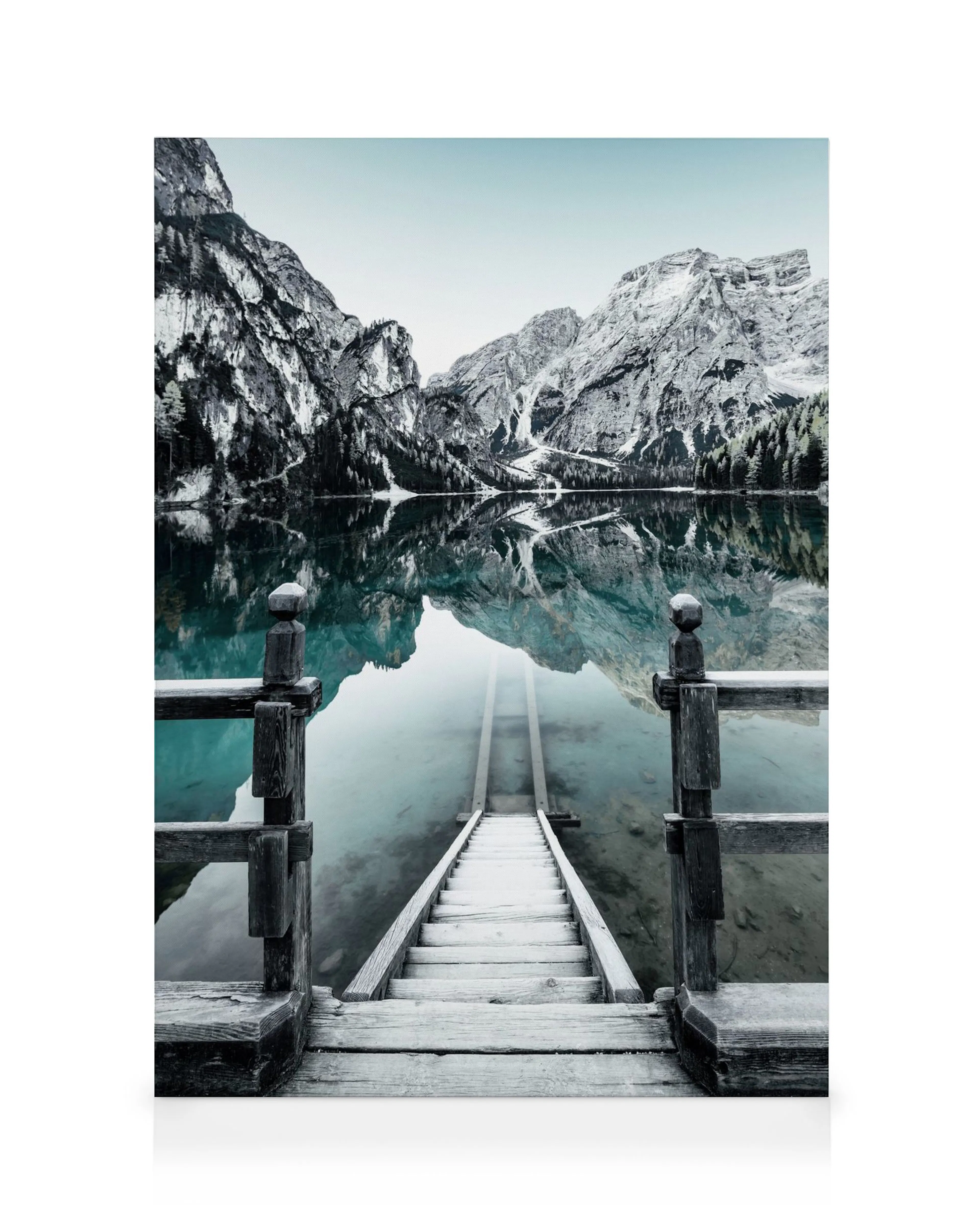 Braies Lake canvas showing a wooden pier extending into the calm, clear water, surrounded by dramatic snow-capped mountains and 