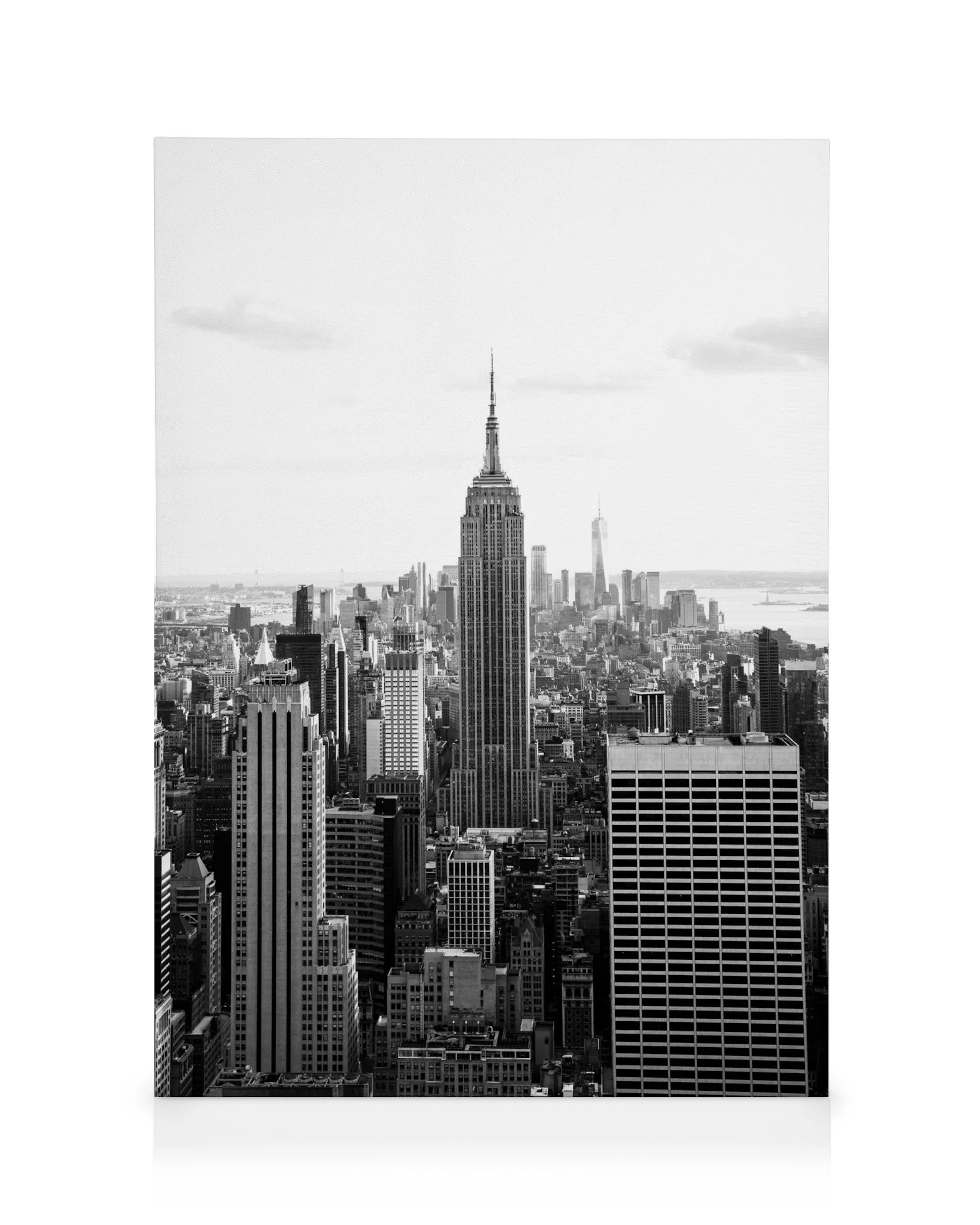 Stampa su tela skyline bianco e nero, Empire State Building con guglia e grattacieli cittadini.