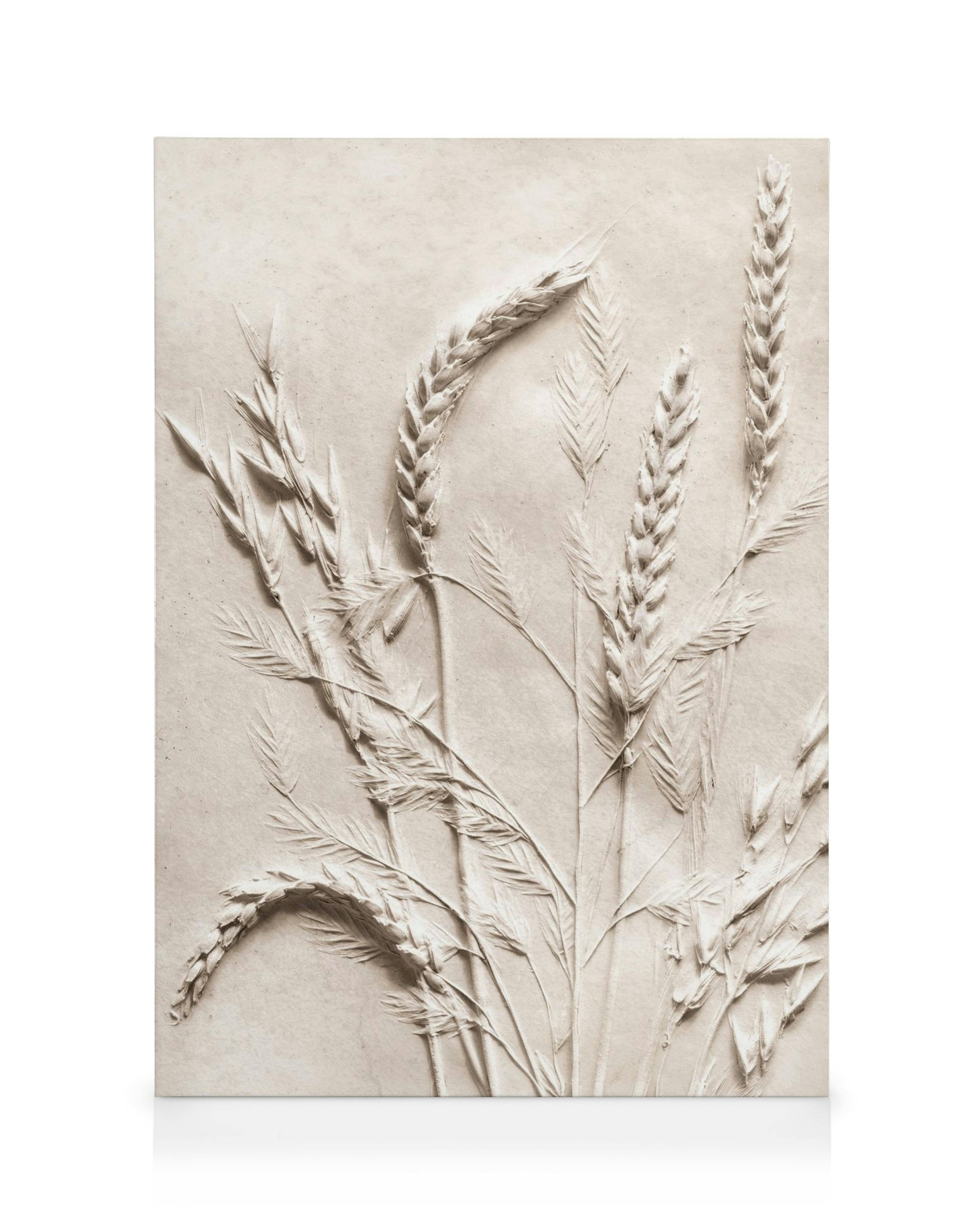 Embossed wheat stalks and leaves on a light beige background, a textured canvas print.