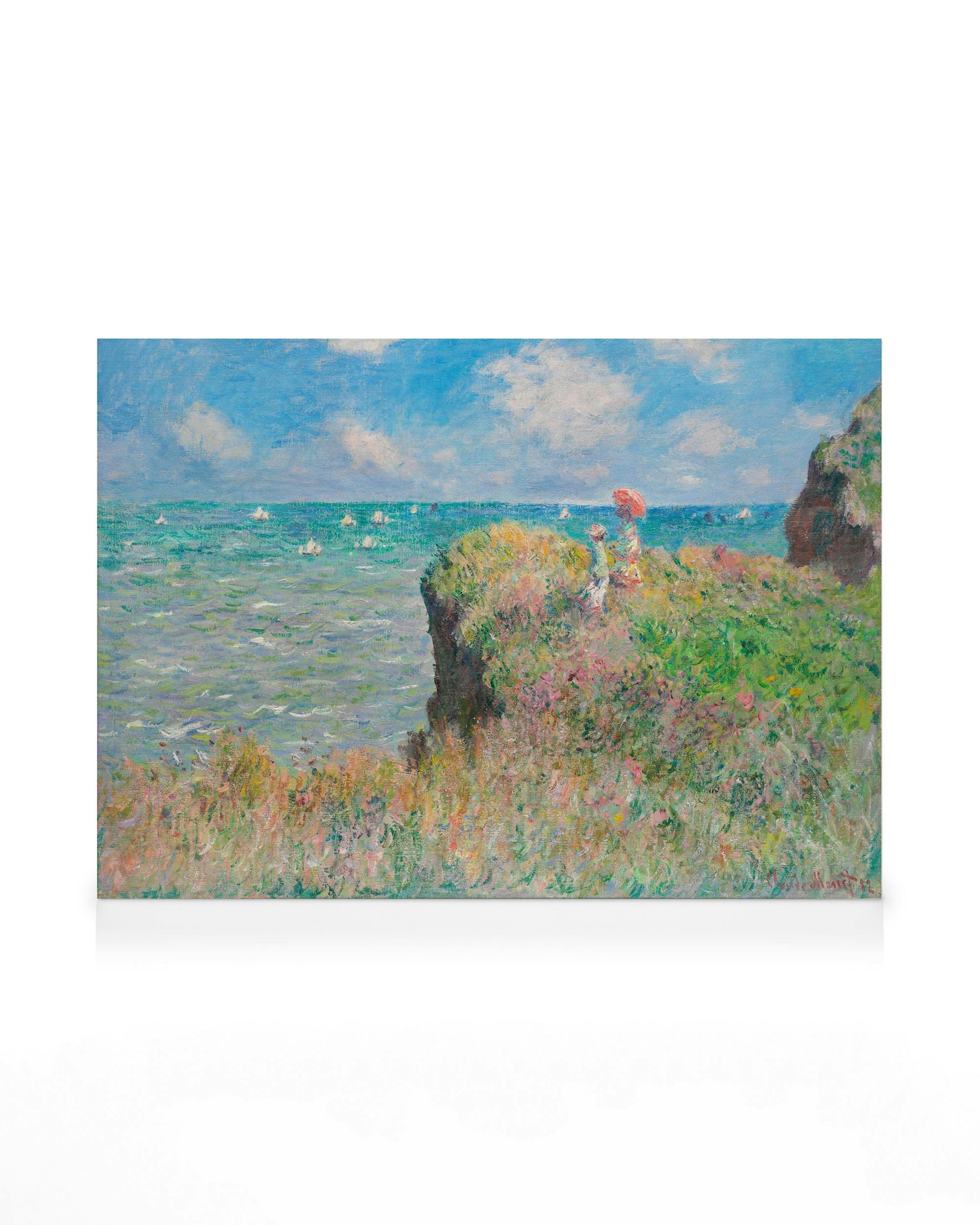 Monet Cliff Walk at Pourville canvas print, sea landscape with blue water, green cliffs, and boats on waves.