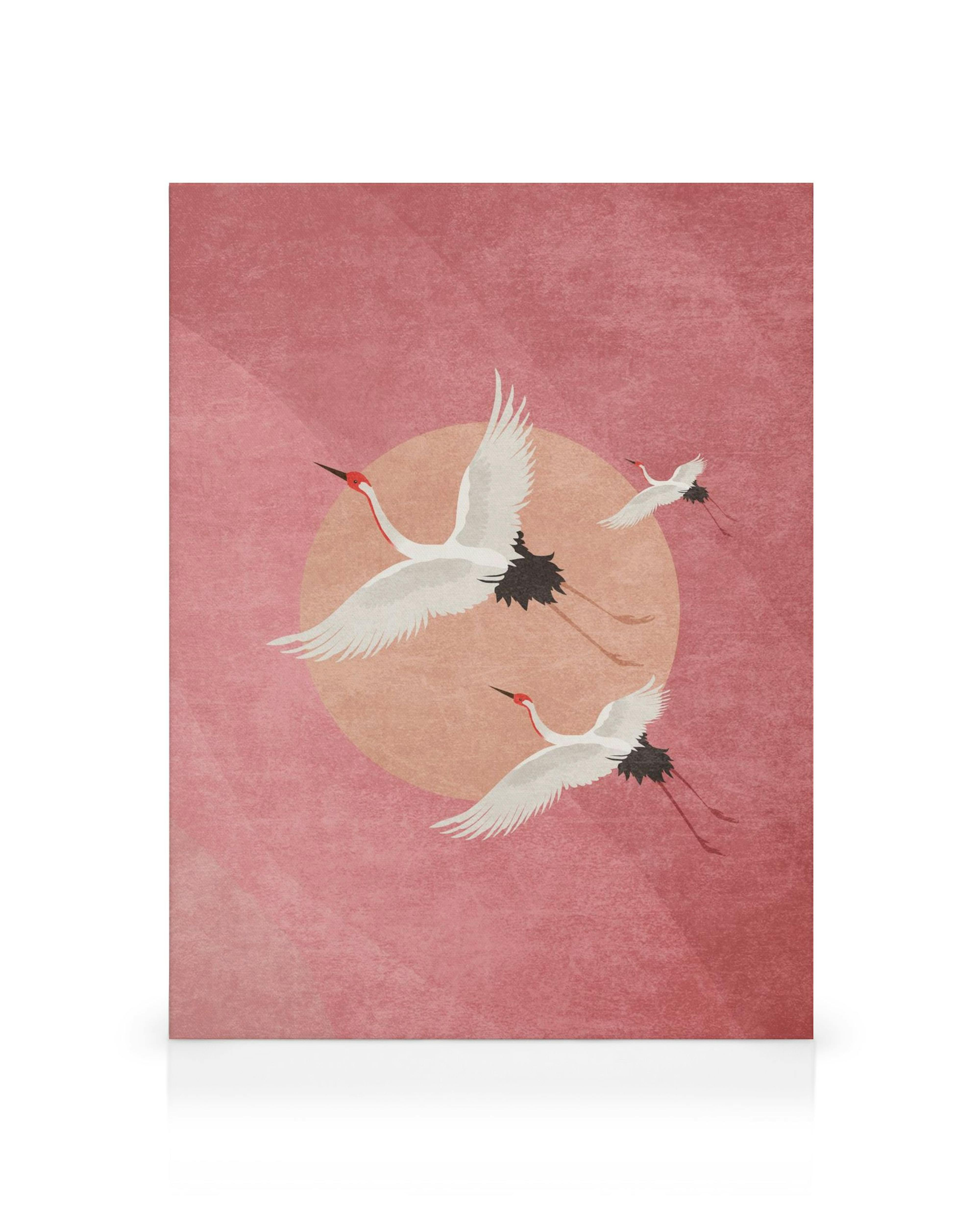 Leinwandbild mit fliegenden Kranichen vor einem rosafarbenen Sonnenuntergang in japanischem Stil