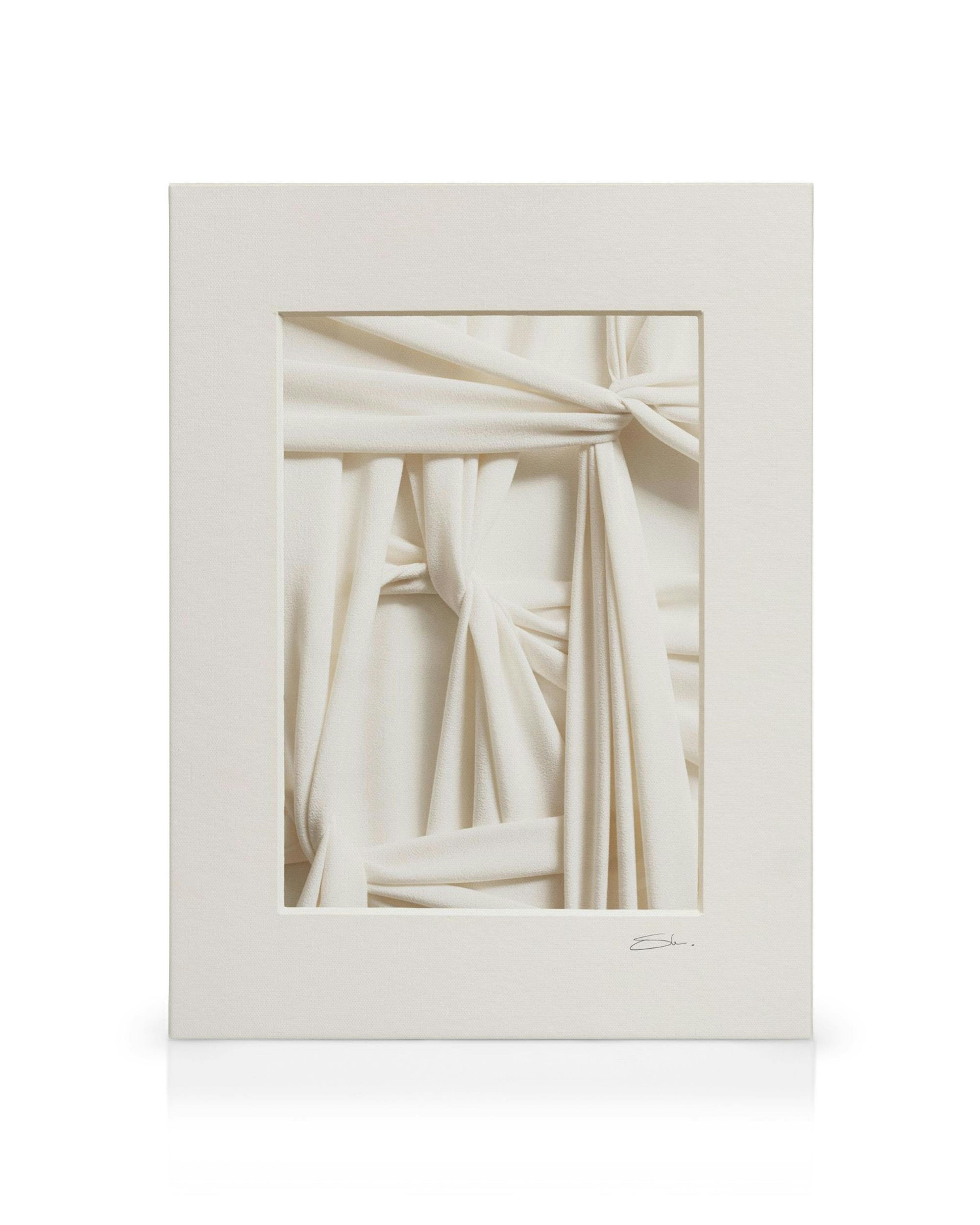 Tactile Fabric No1 canvas print, featuring cream fabric draped and knotted to create a textured, sculptural artwork.