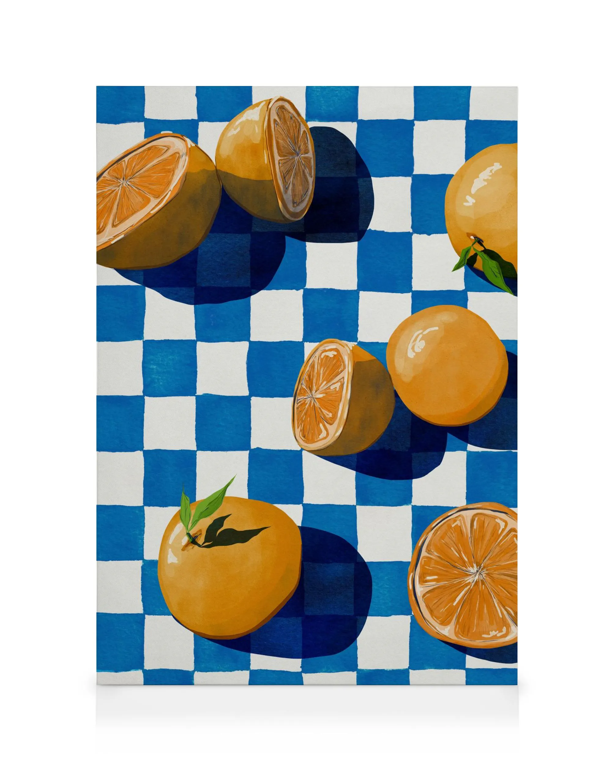 Vibrant orange fruits, whole and cut, on a blue and white checkered background canvas print.