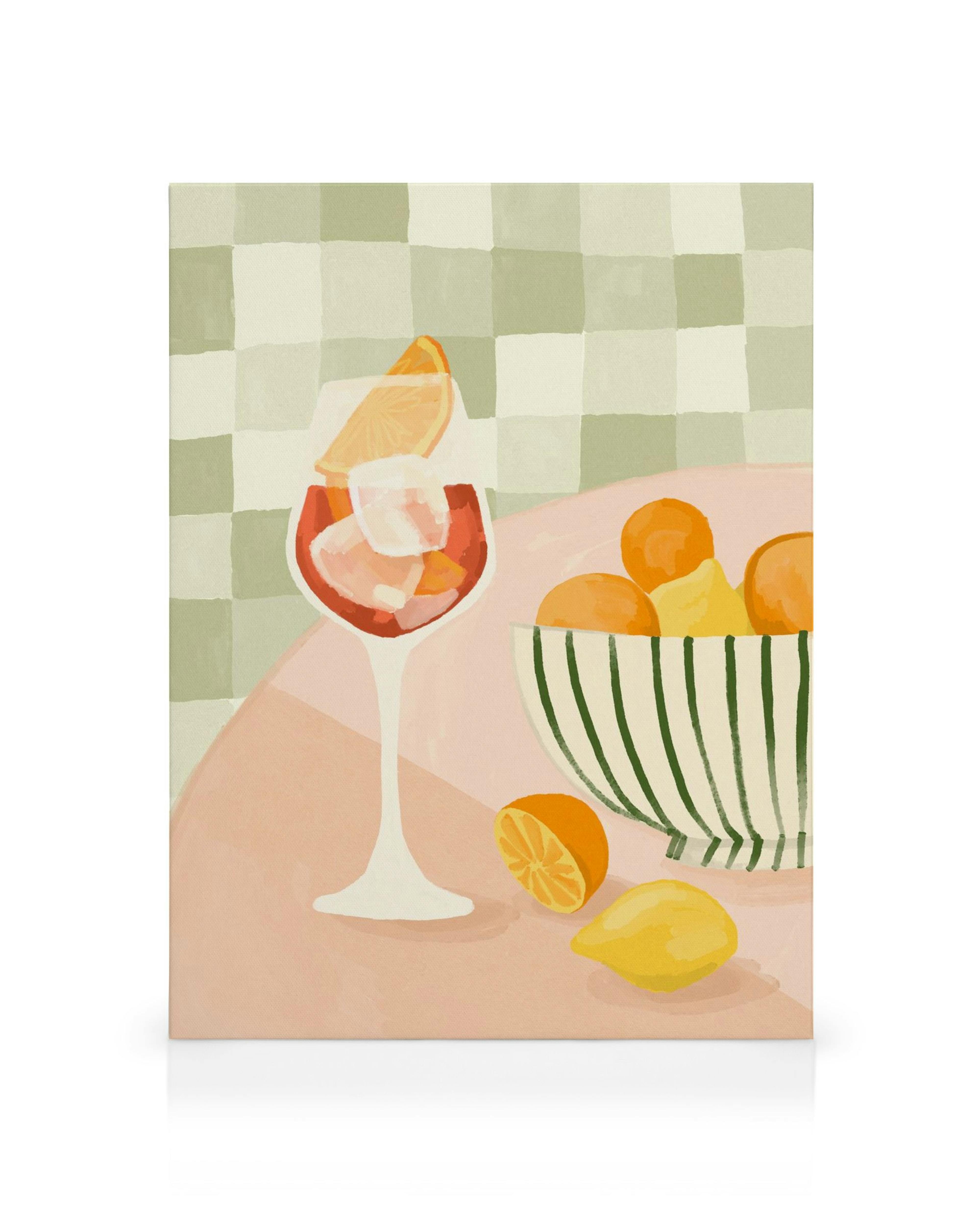 Canvas print of oranges in striped bowl, lemons, and red wine with ice on a checkered cloth for kitchen wall art.