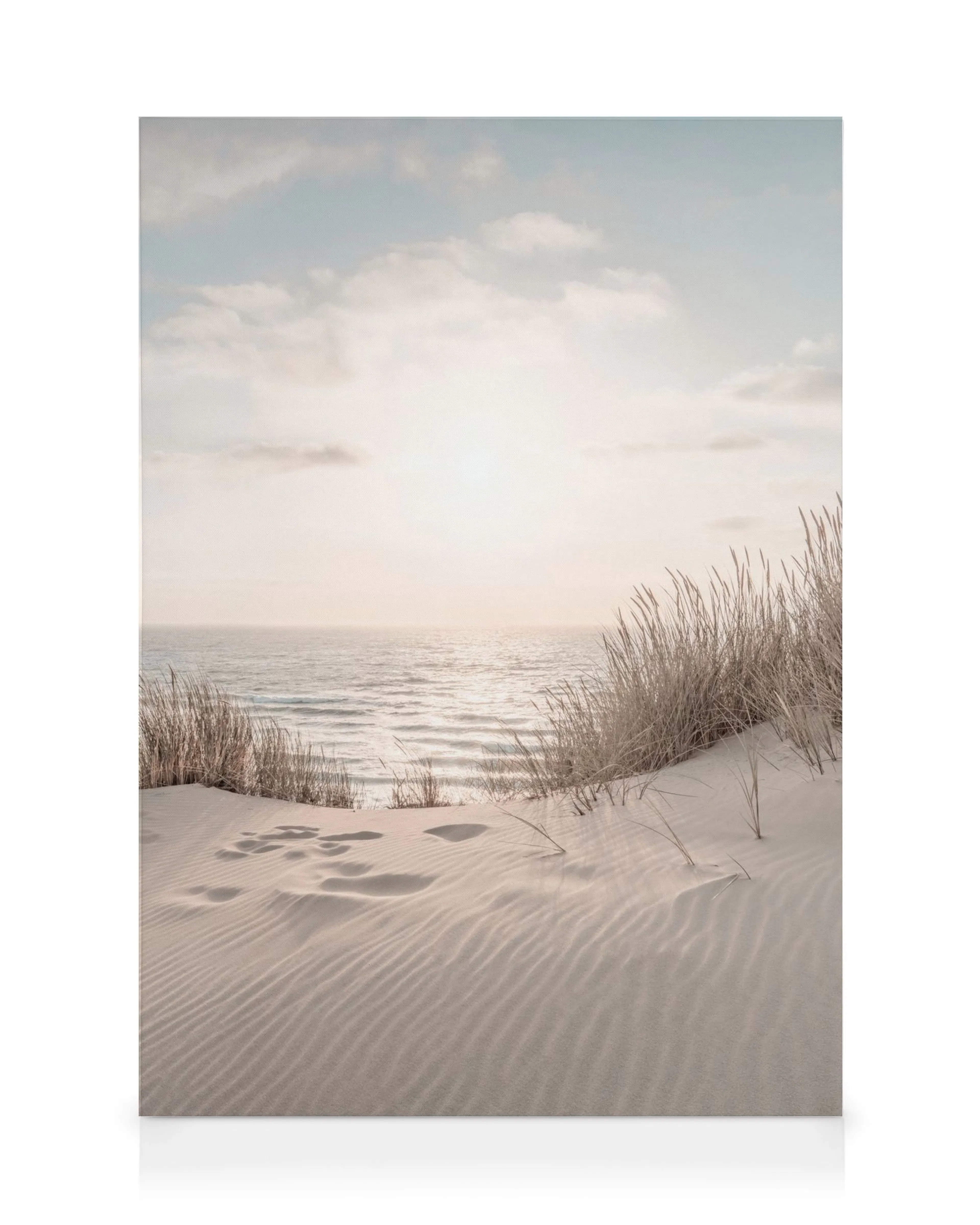 Calming Dune Beach canvas print with footprints on sand leading to a tranquil sea, perfect wall art.