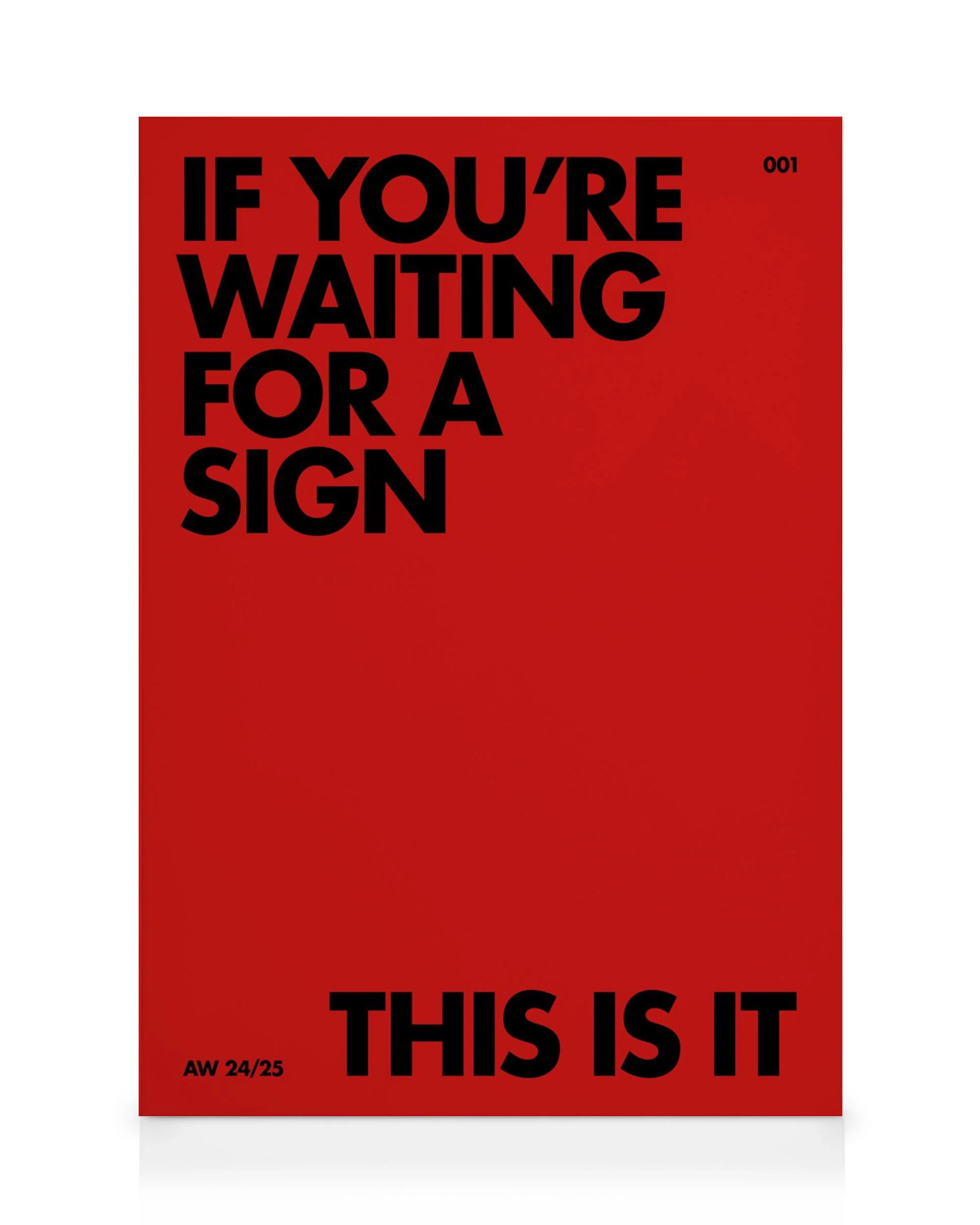 Ein Leinwandbild mit dem Text IF YOURE WAITING FOR A SIGN THIS IS IT in Schwarz auf rotem Hintergrund.