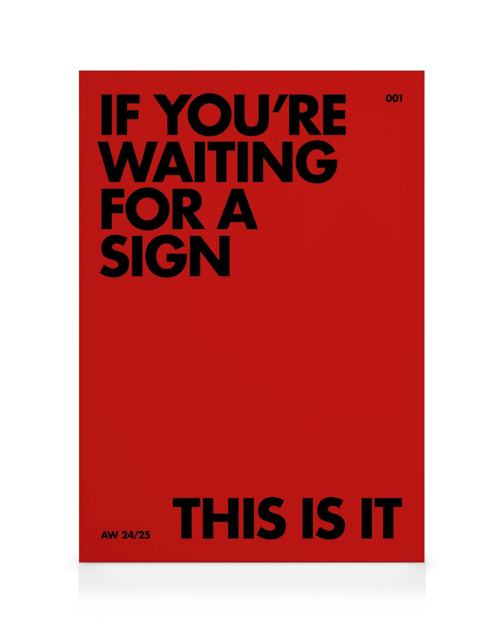 A canvas print with bold black text on a vibrant red background, reading IF YOURE WAITING FOR A SIGN THIS IS IT.