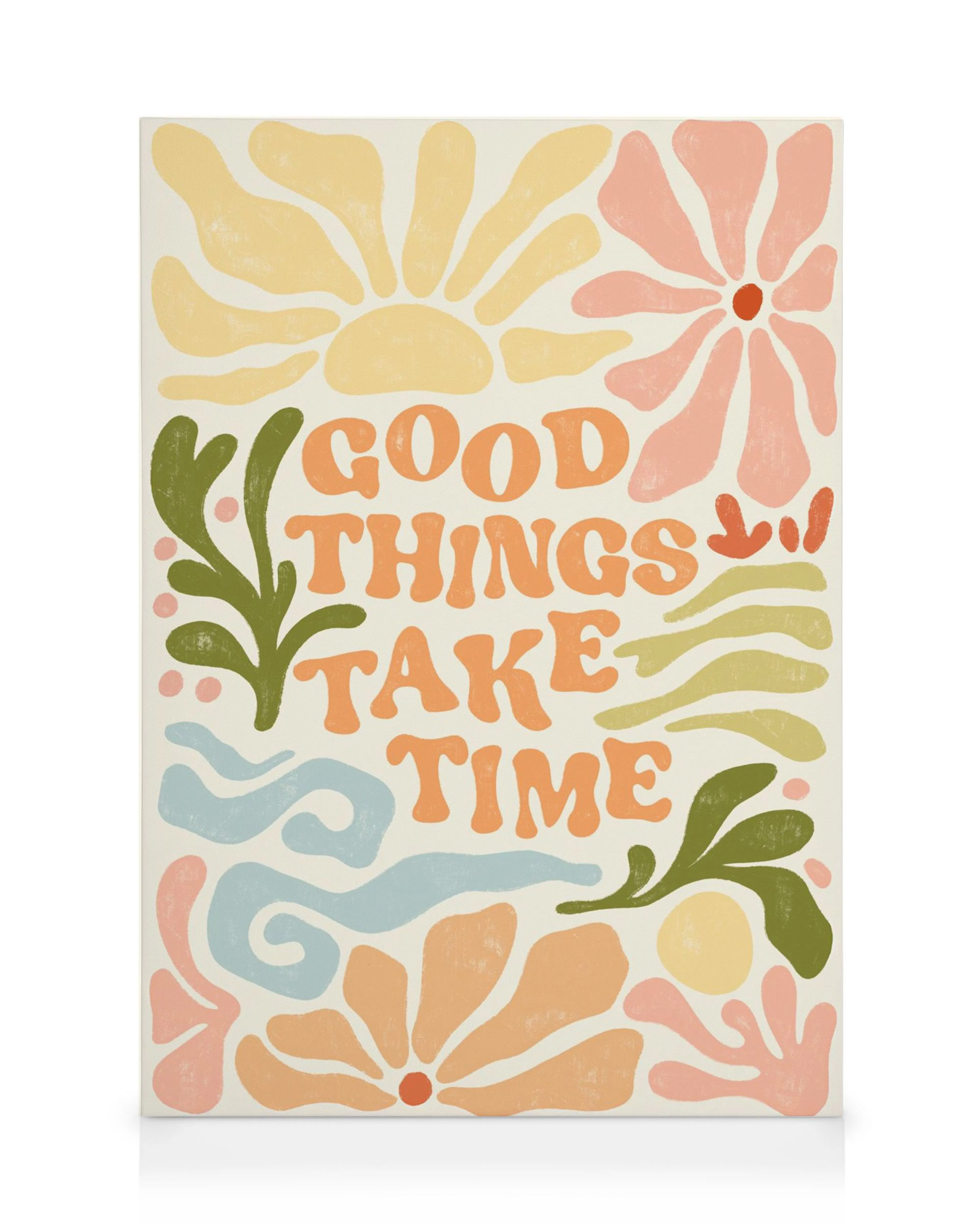A canvas print with a quote Good Things Take Time surrounded by floral and organic shapes in warm, earthy colours.