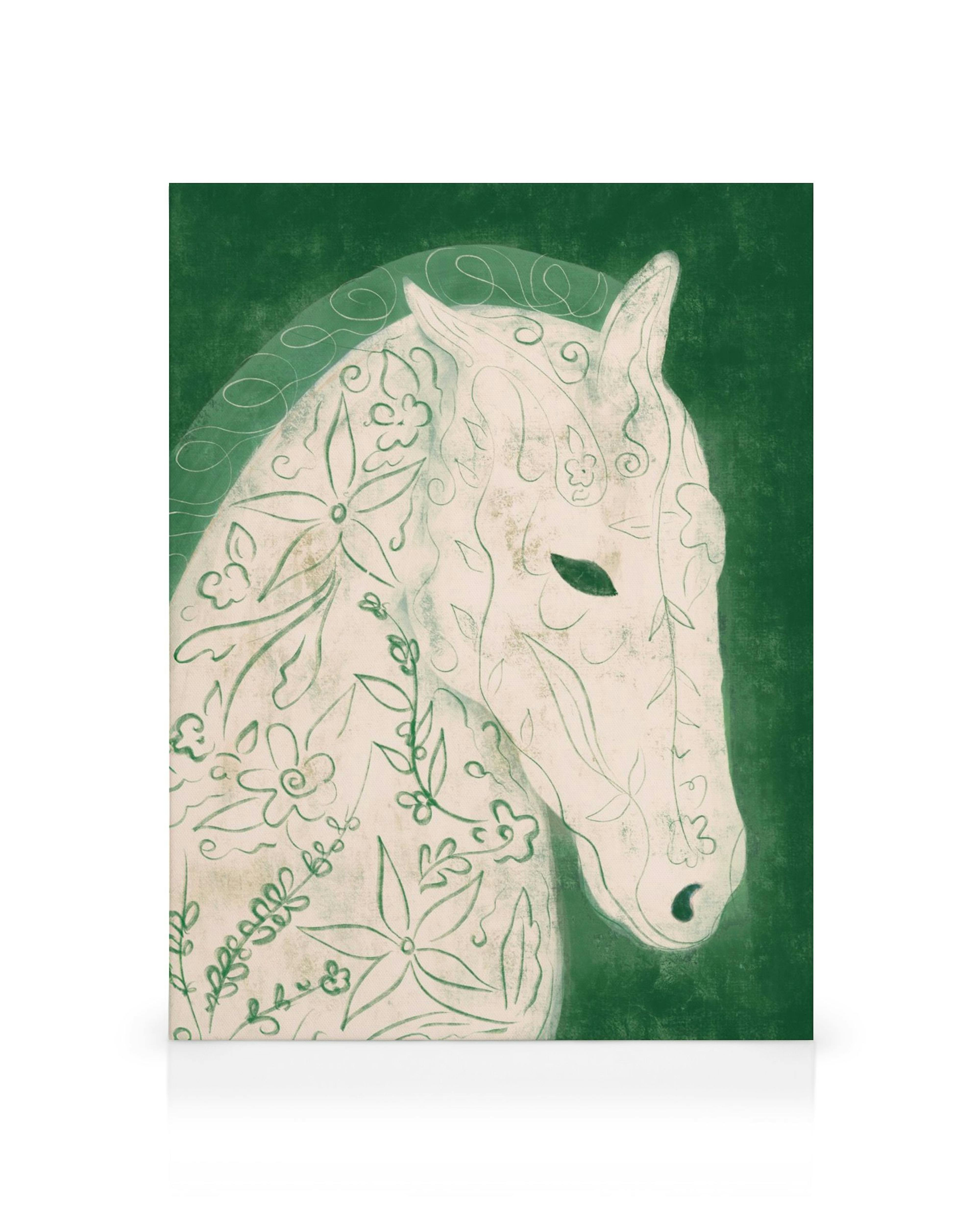 Lerretsbilde av et hvitt hestehode med grønne blomster- og bladmotiver, på en mørkegrønn bakgrunn.