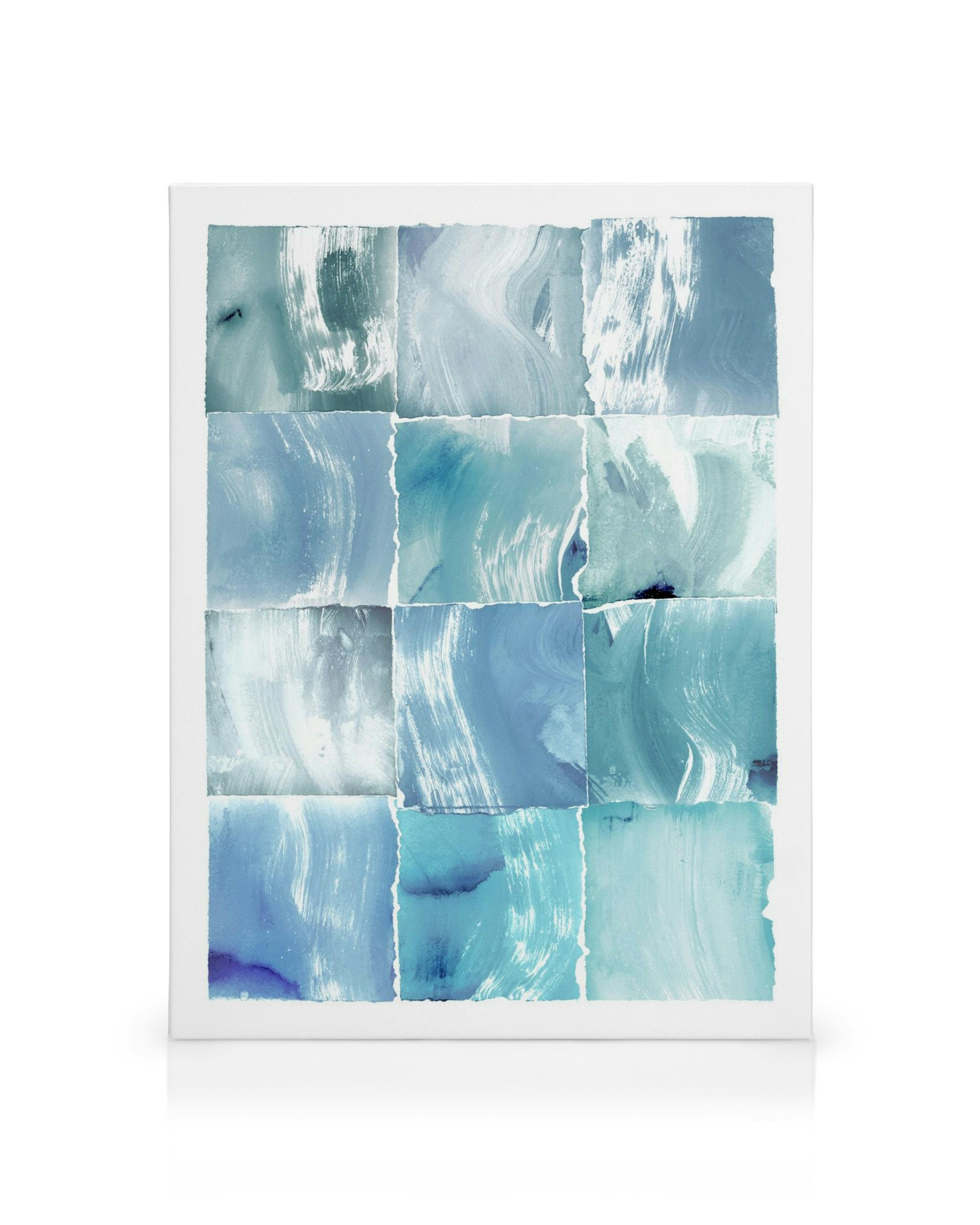 Abstract canvas print with textured blue and white brushstrokes arranged in a grid pattern.