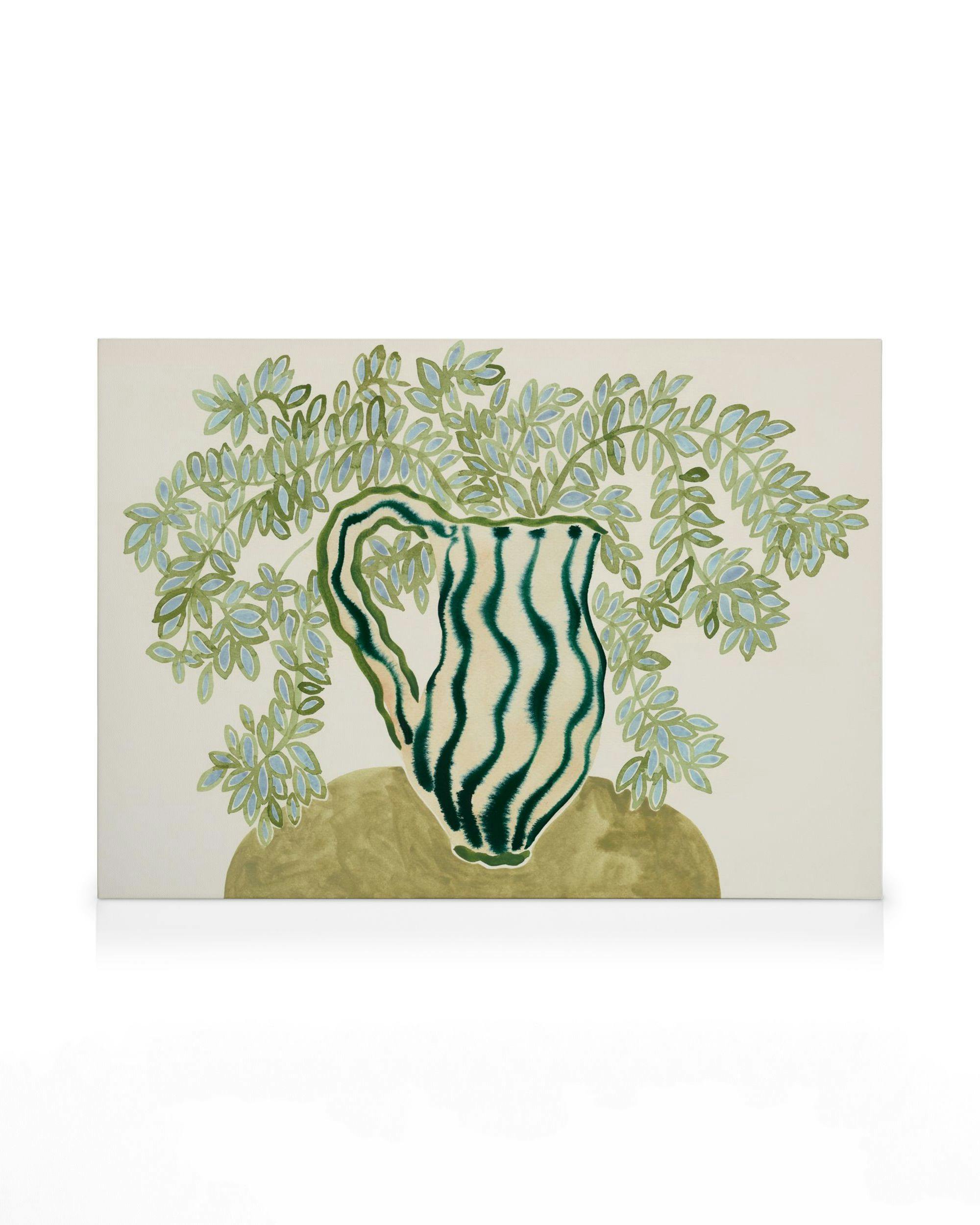 Leinwandbild: Grüne Vase mit blauen und grünen Blättern auf beigem Hintergrund, Stillleben.