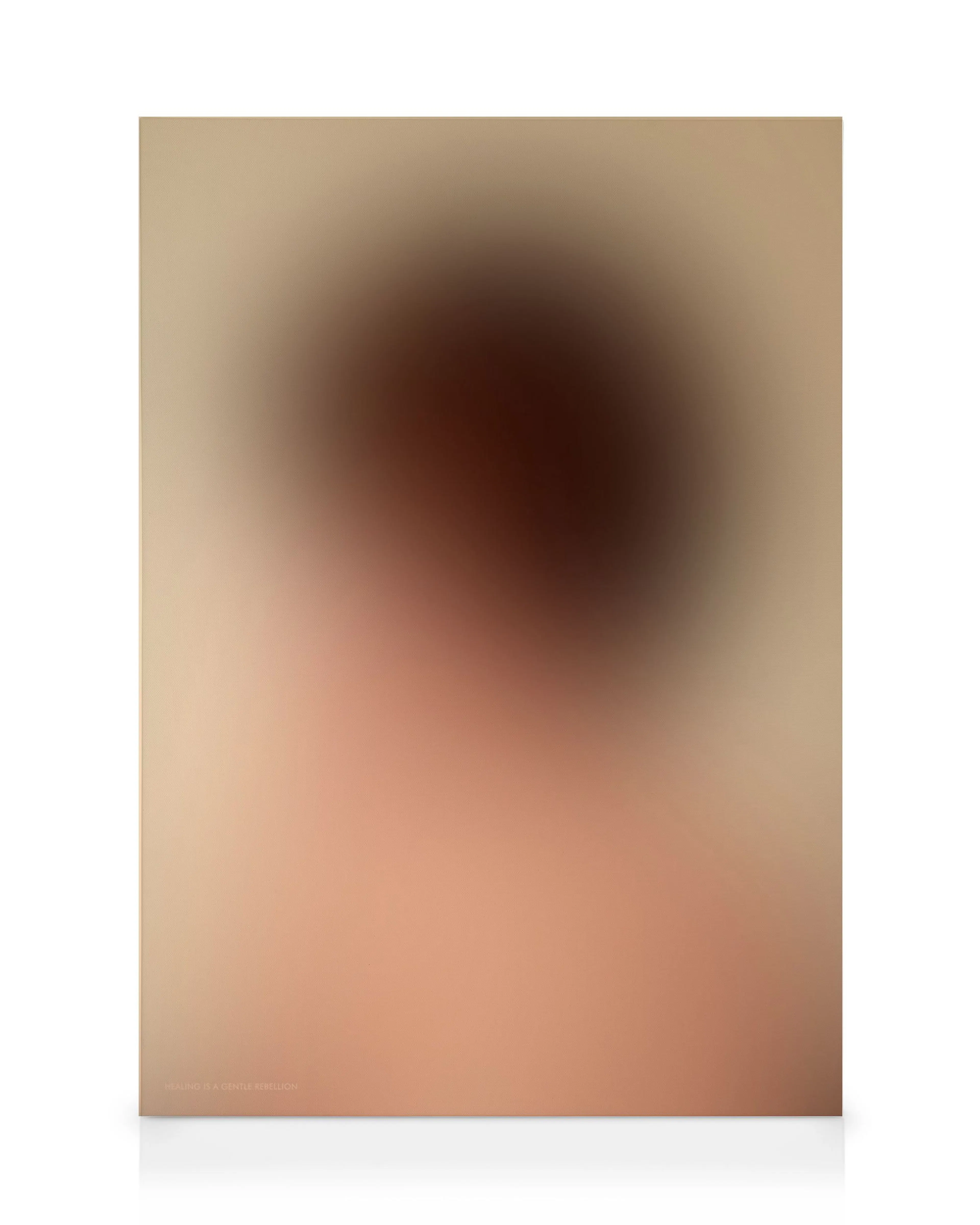 A canvas print featuring a blurred brown shape on a light peach and beige gradient background.