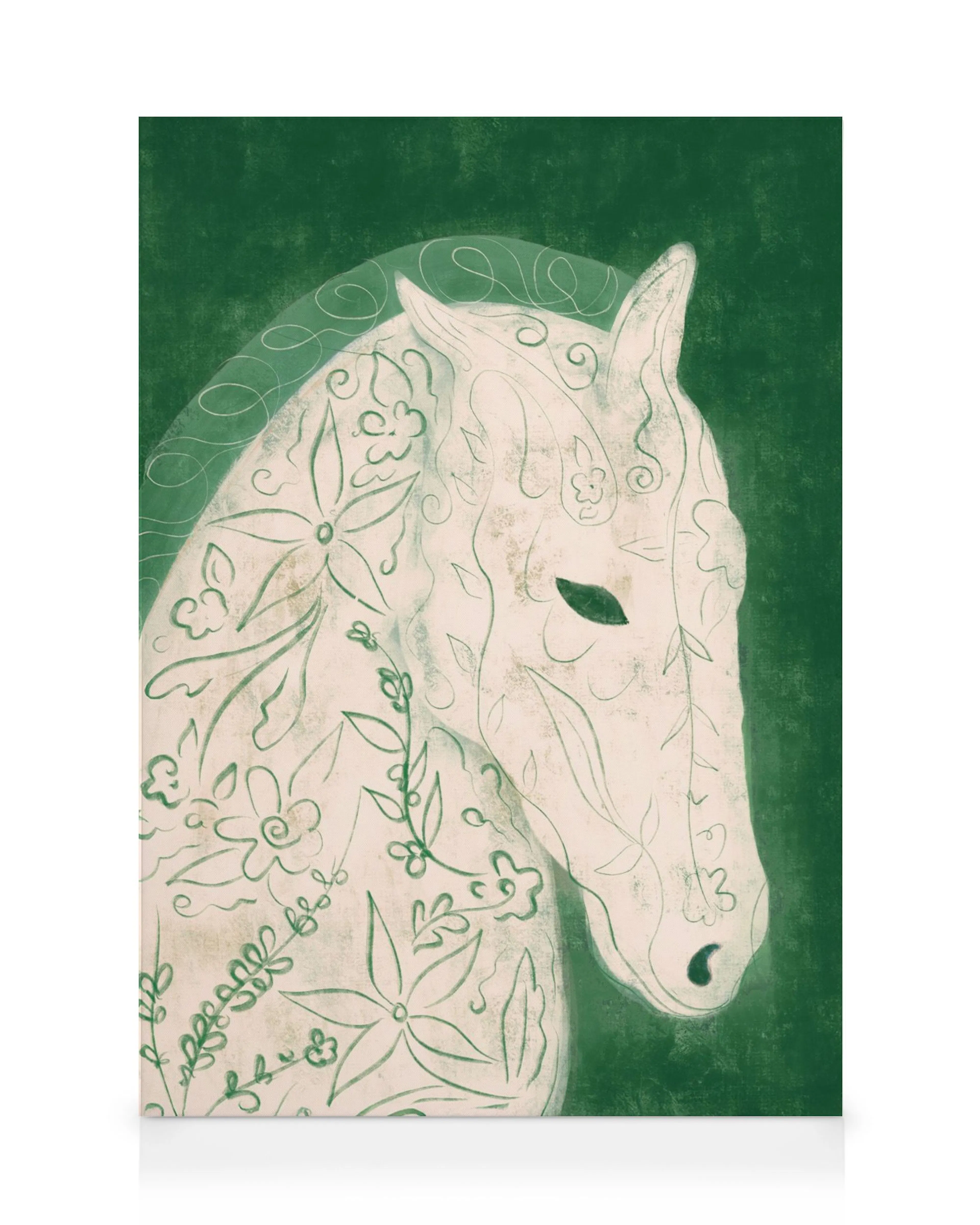 A canvas print featuring a white horse silhouette adorned with green floral and leafy patterns on a deep green background.