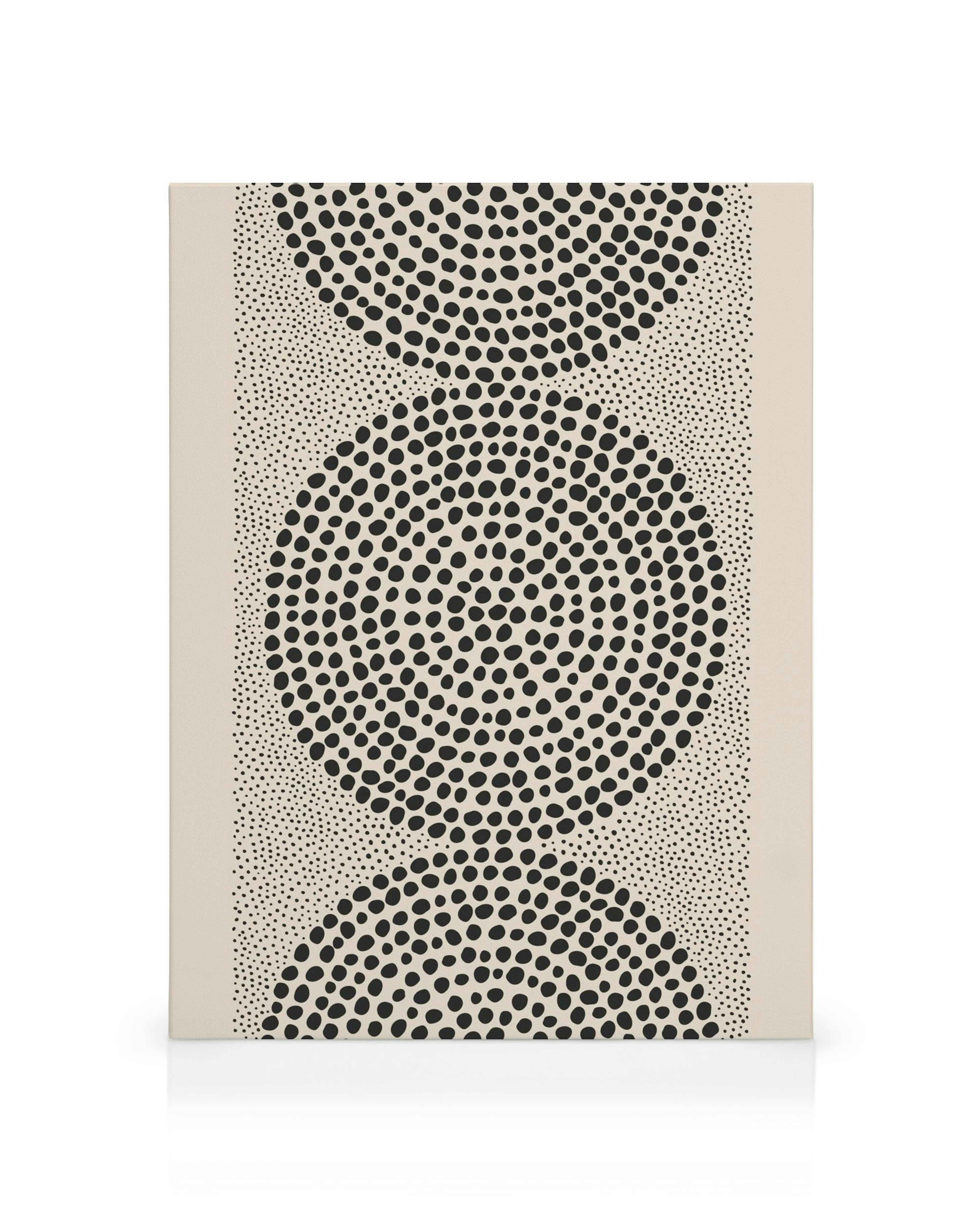 Obraz na płótnie z czarno-białymi wzorami kropek układającymi się w trzy sferyczne kształty na beżowym tle. Geometryczny motyw z