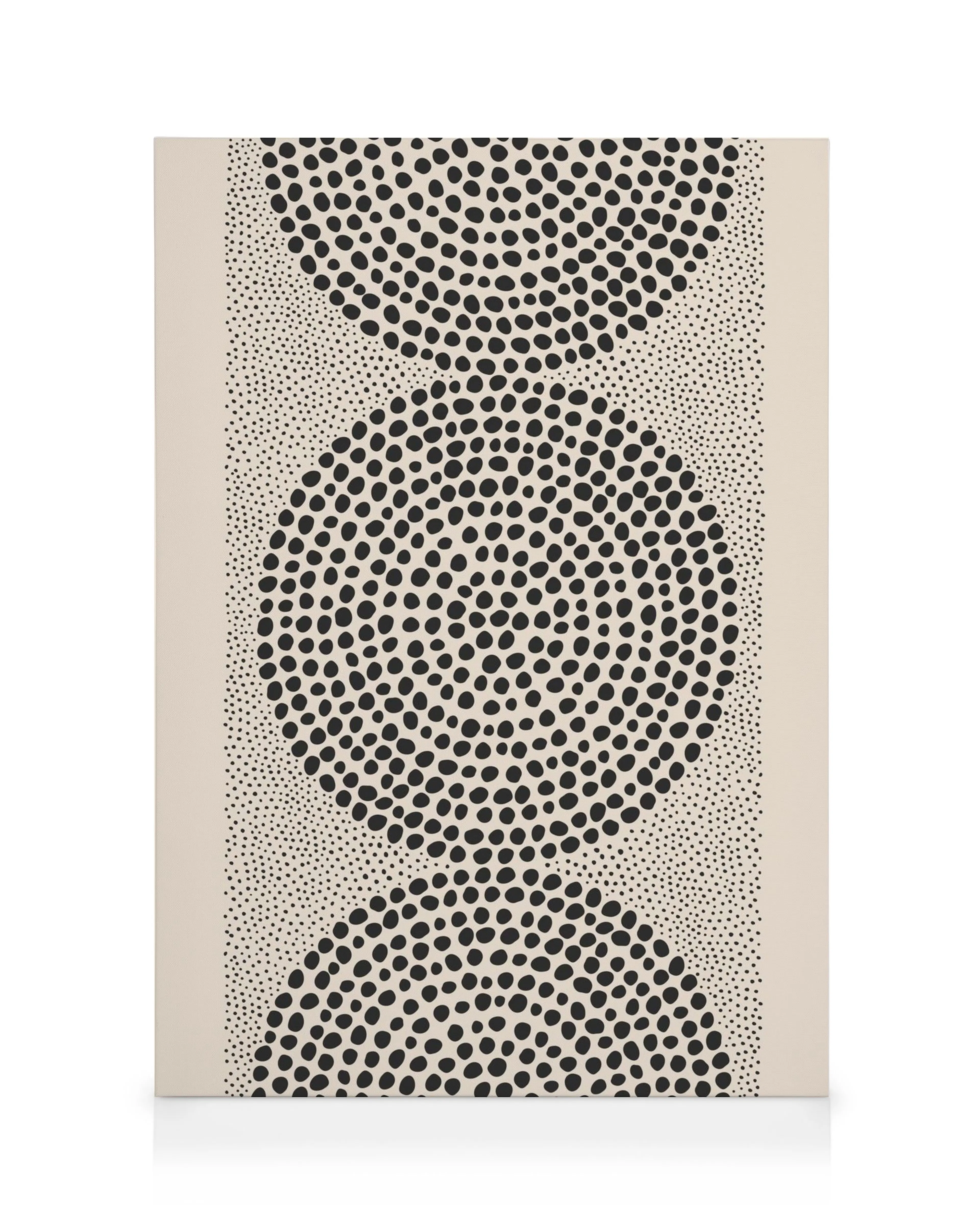Toile à motif pointillisme avec trois sphères noires sur fond beige, créant un effet 3D géométrique.