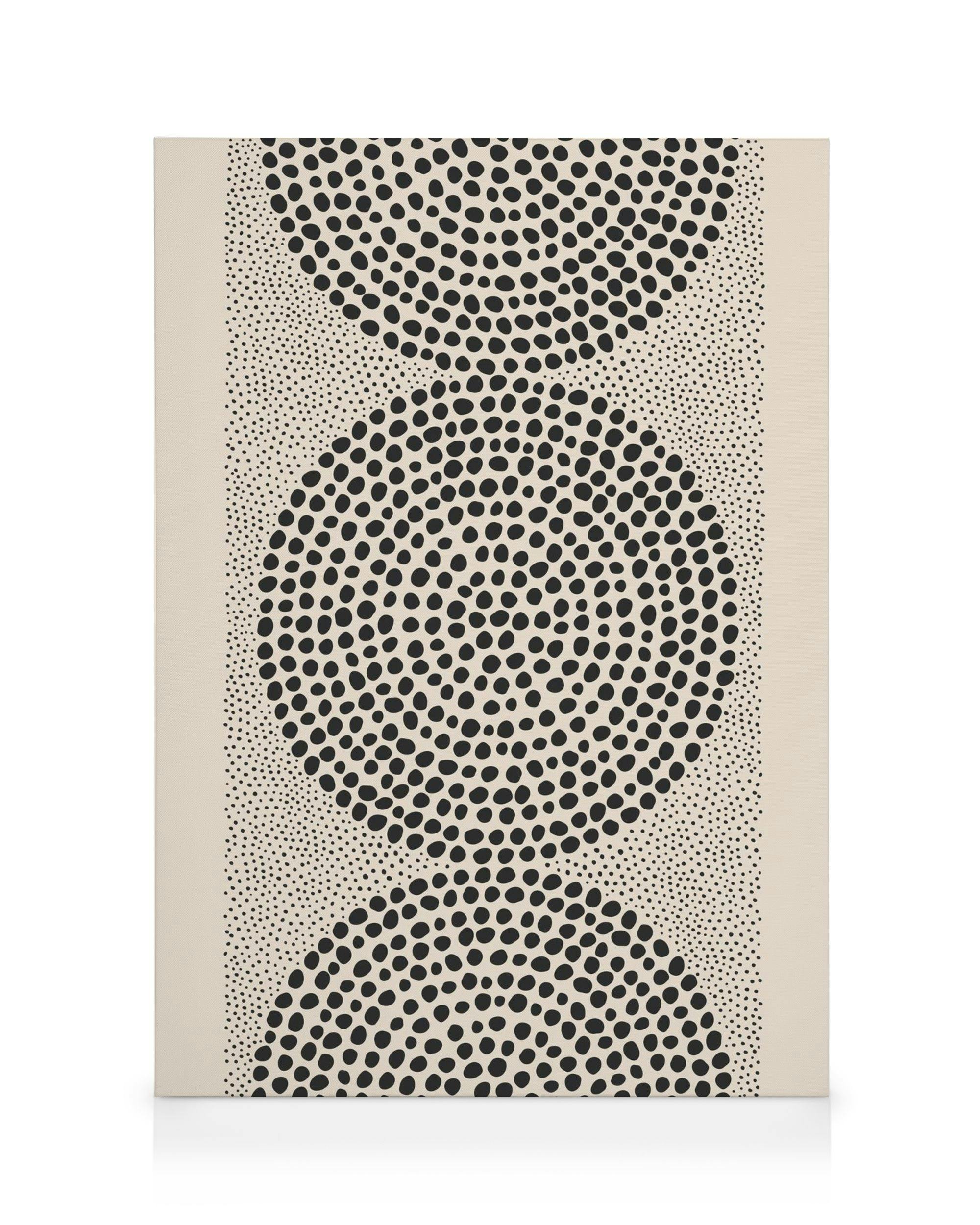 Καμβάς με μαύρες βούλες που σχηματίζουν τρεις καμπύλες, σε μπεζ φόντο, αφηρημένο σχέδιο