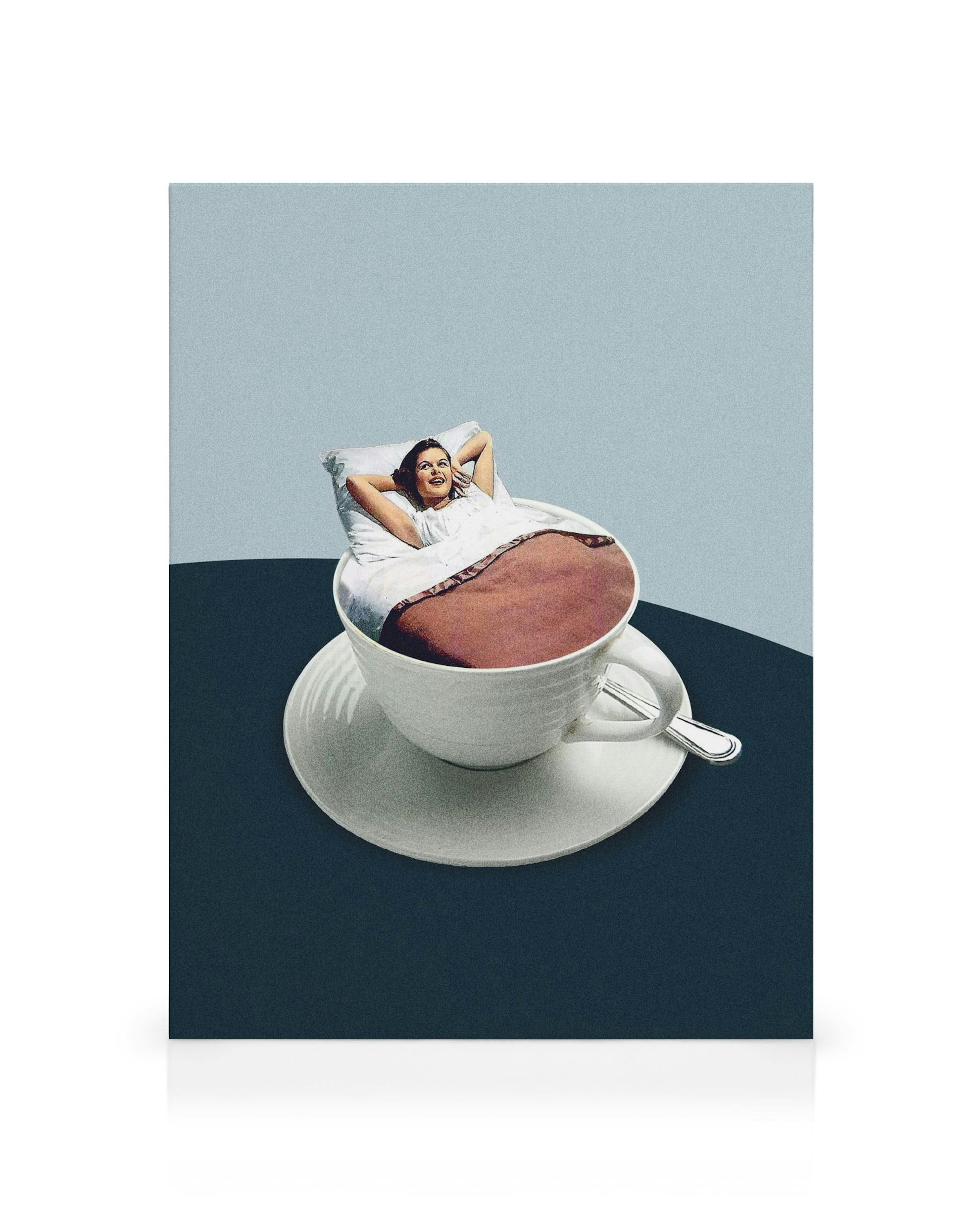Surrealist canvas print of a woman in a giant teacup, under a brown blanket, with her head on a pillow.