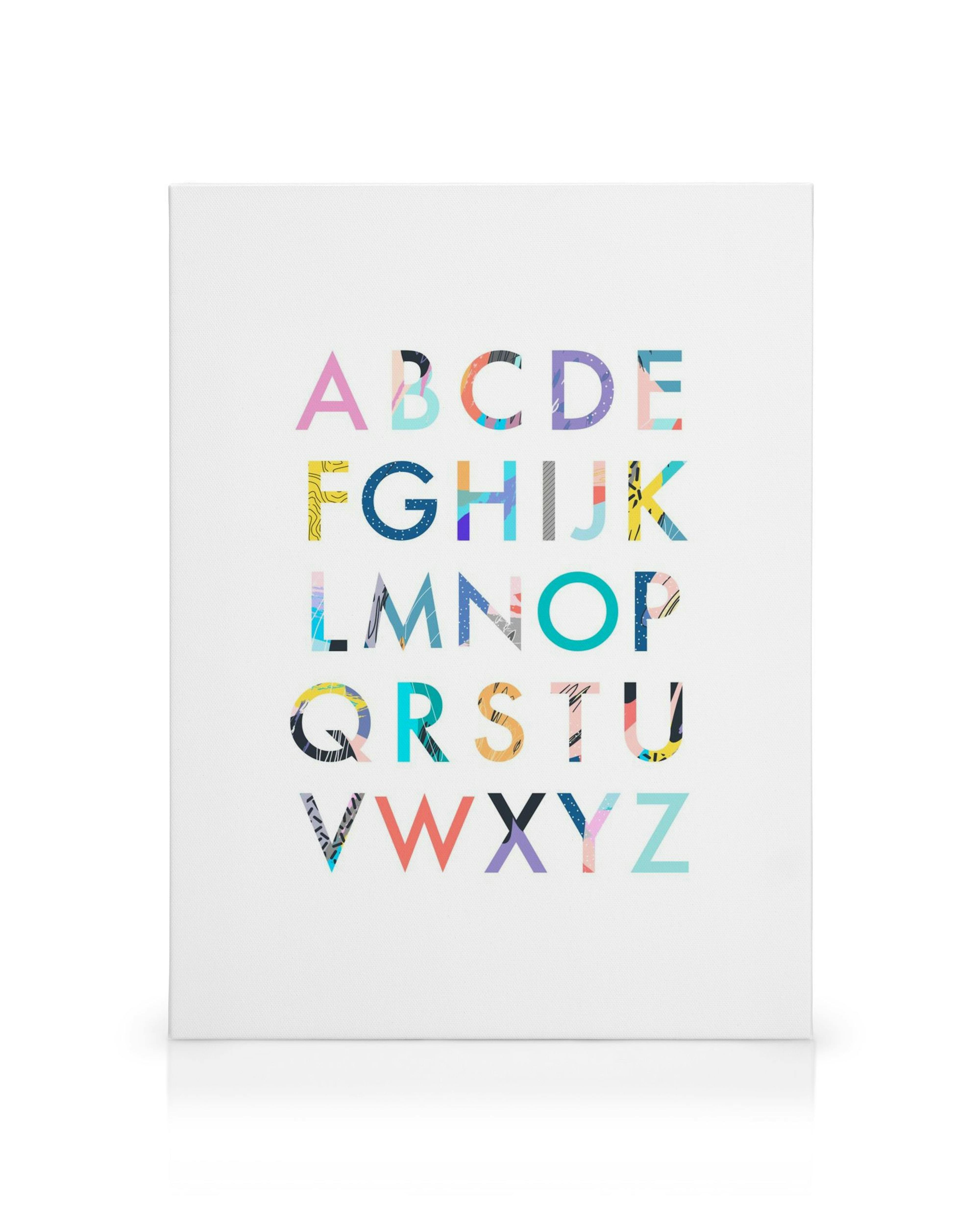 Colourful alphabet canvas print with patterned letters on a white background, ideal for kids rooms.