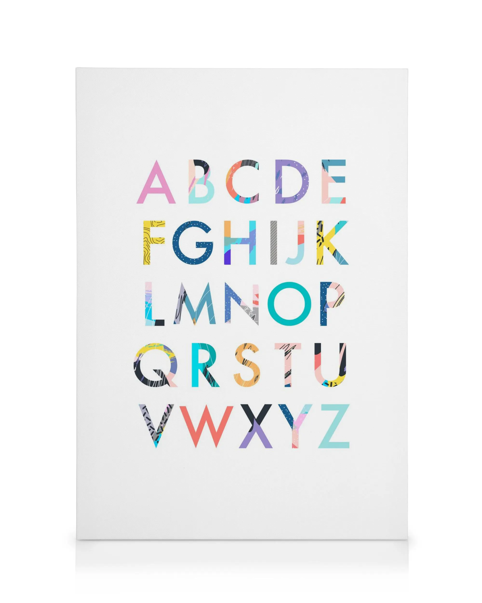 Colourful alphabet canvas print with letters featuring stripes and spots on a clean white background, ideal for a childs room.