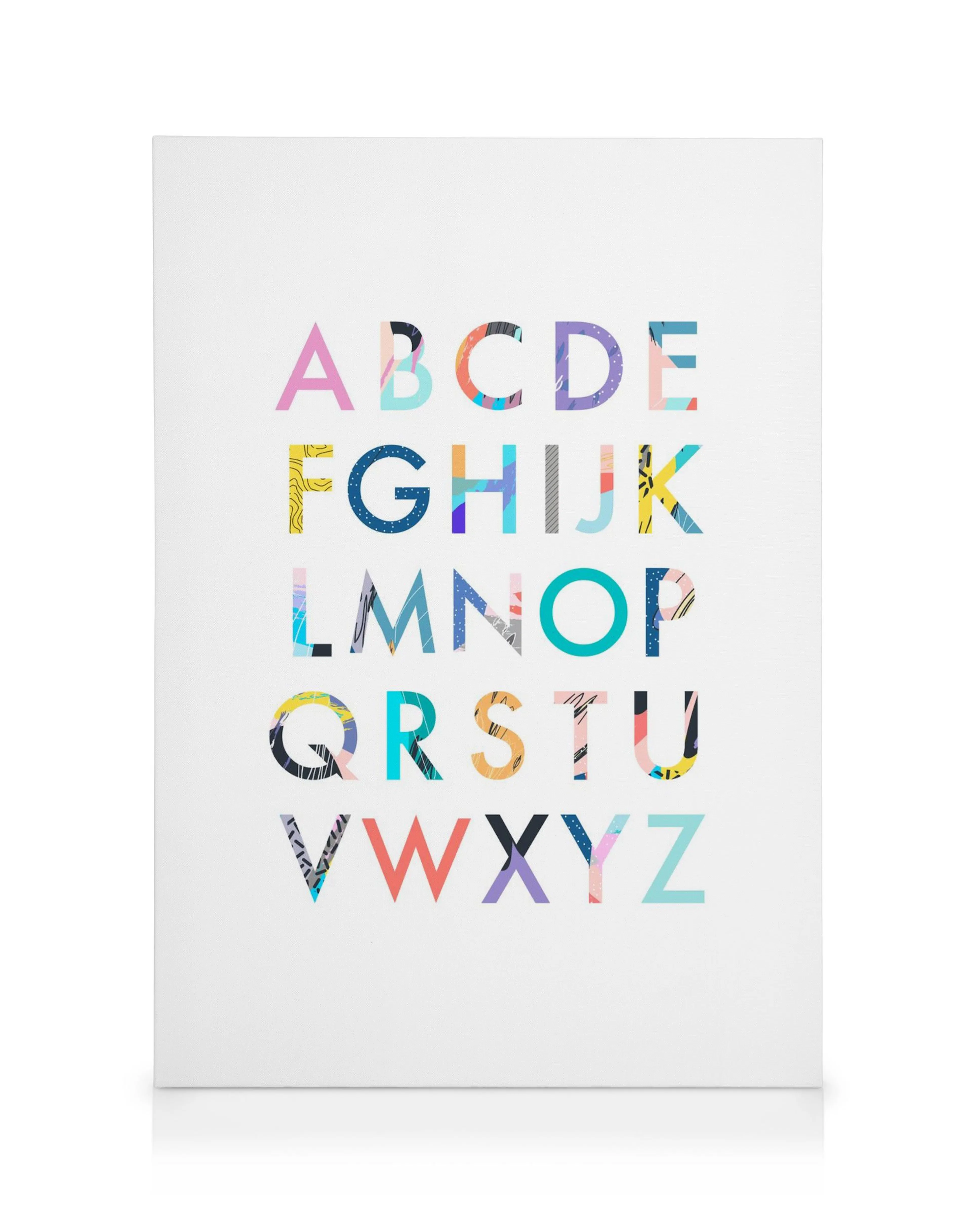 Colourful alphabet canvas print with letters featuring stripes and spots on a clean white background, ideal for a childs room.
