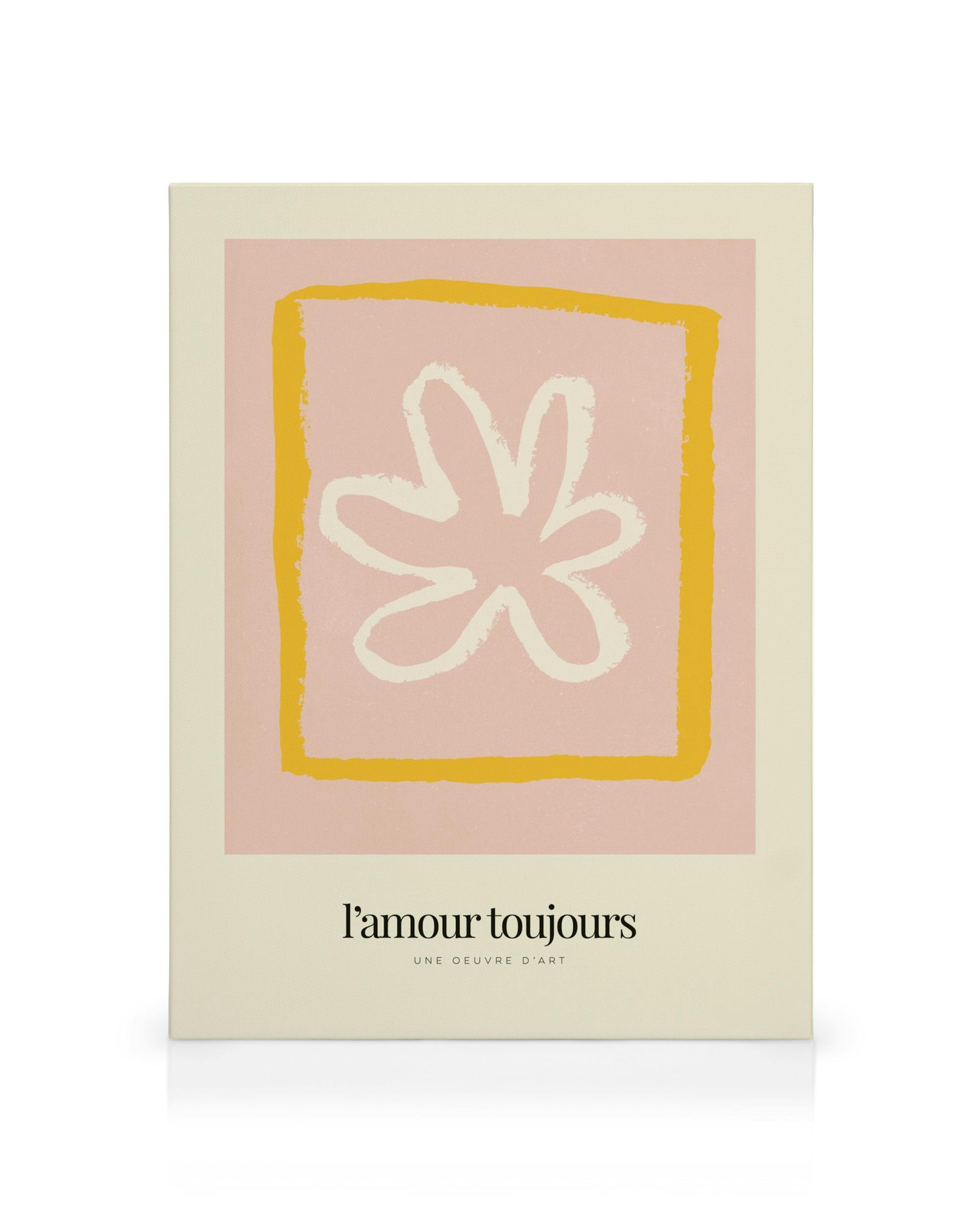 Lærred med lyserød baggrund, gul firkantet ramme, og hvid blomsterform, med teksten lamour toujours.