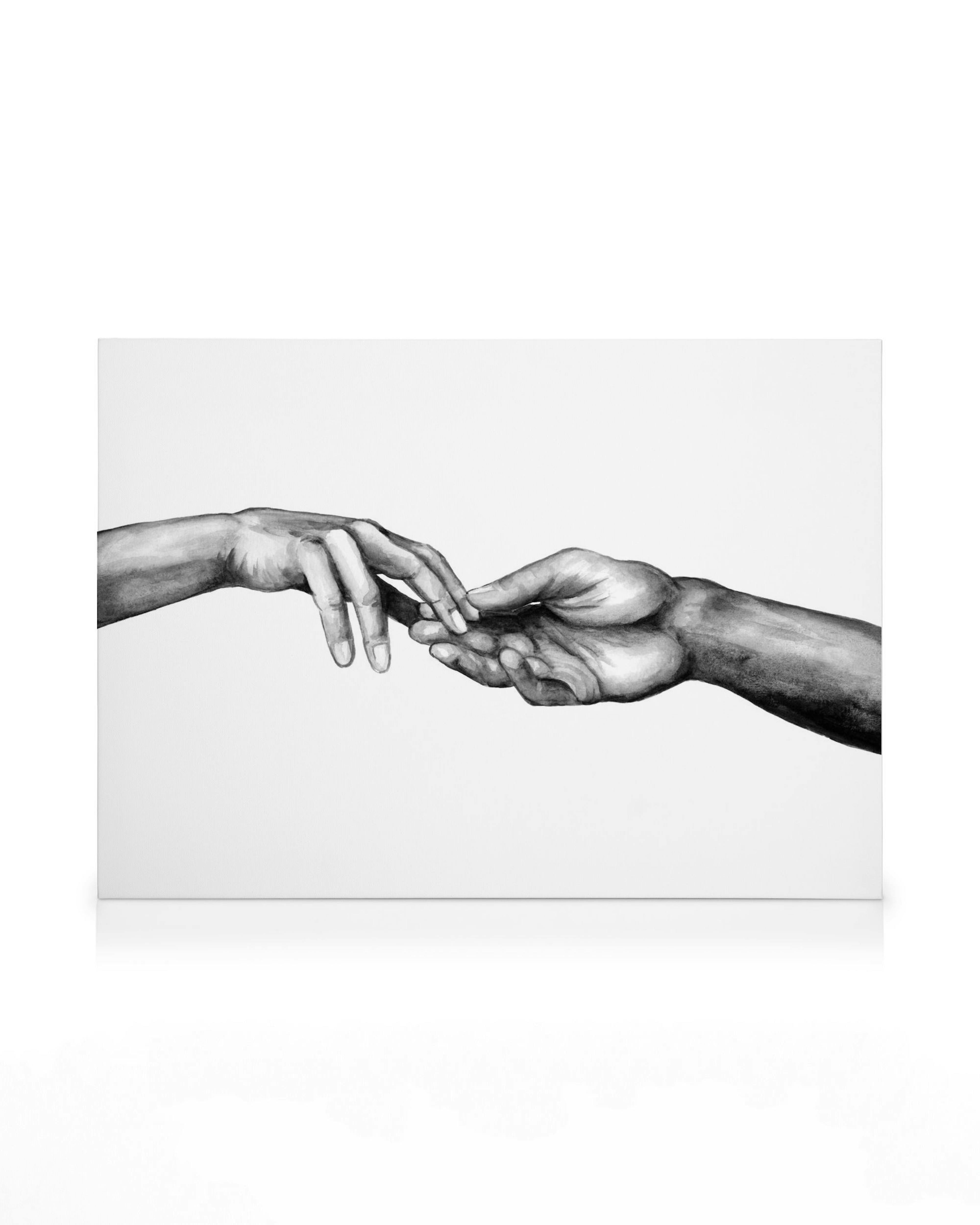 Black and white watercolor canvas print of two hands, one light-skinned and one dark-skinned, about to touch.