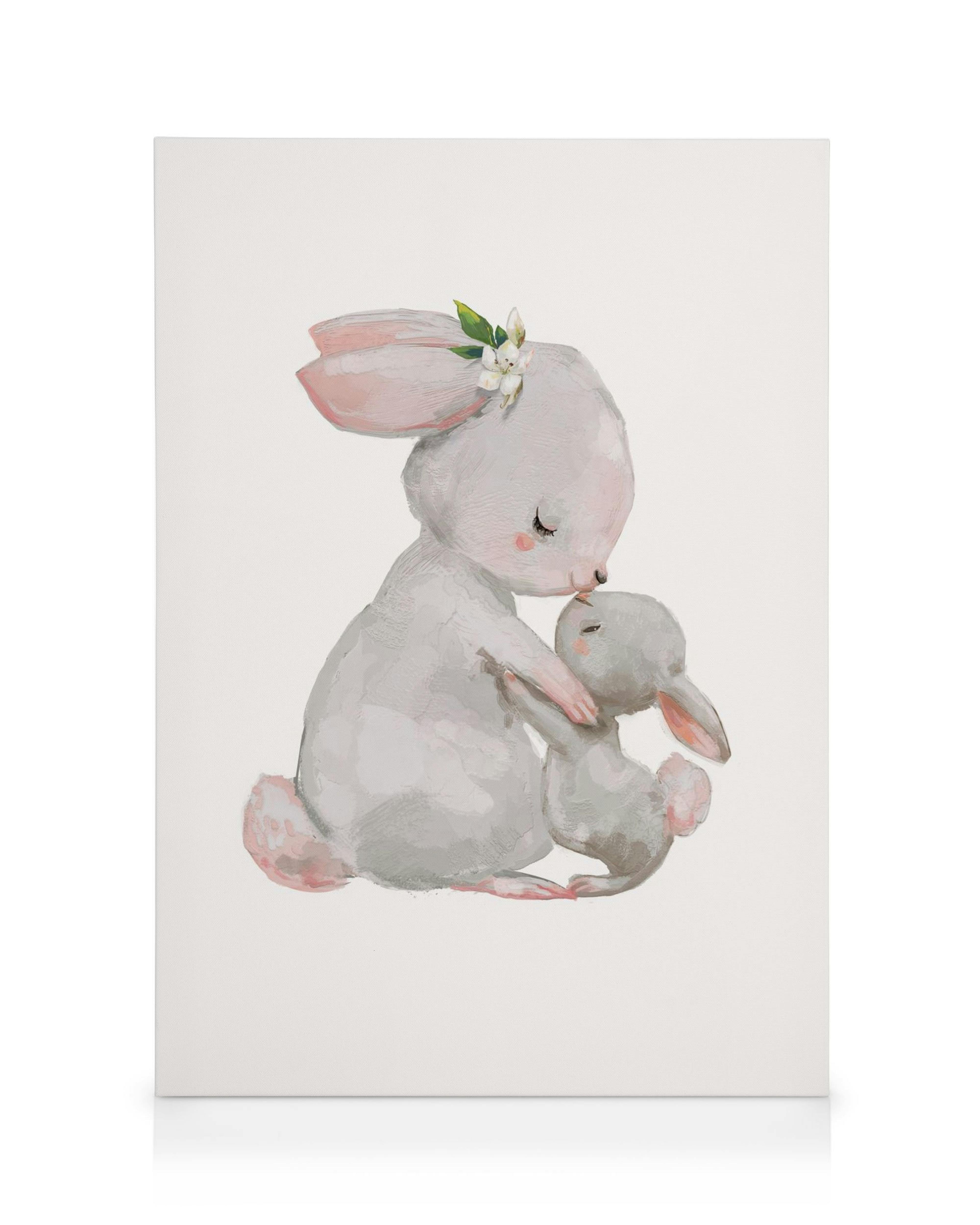 Toile de deux lapins mignons, le plus grand avec une fleur derrière loreille, senlaçant sur fond blanc.