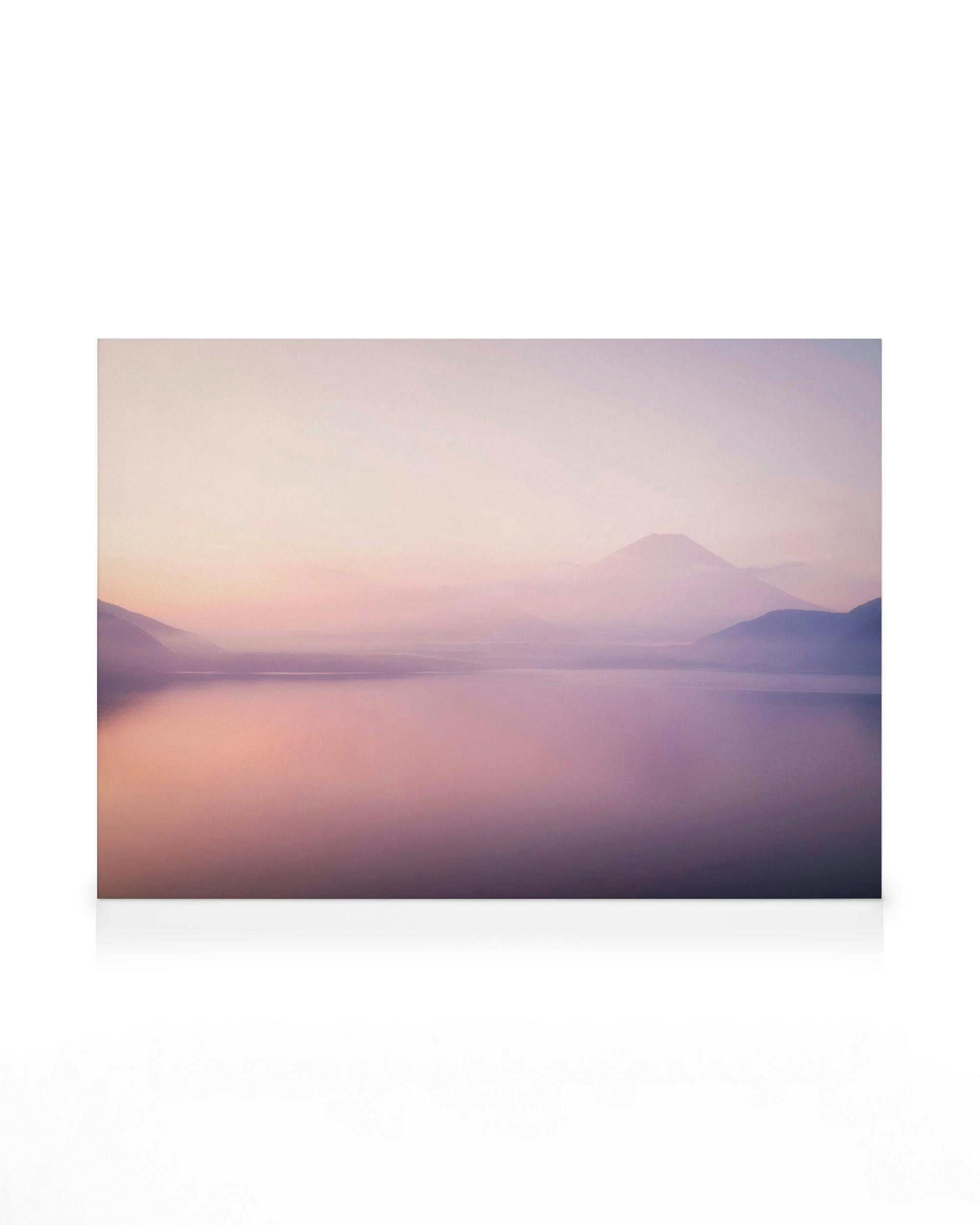 Fuji Mountain over foggy lake canvas print, serene landscape with purple and pink hues, perfect for home decor.