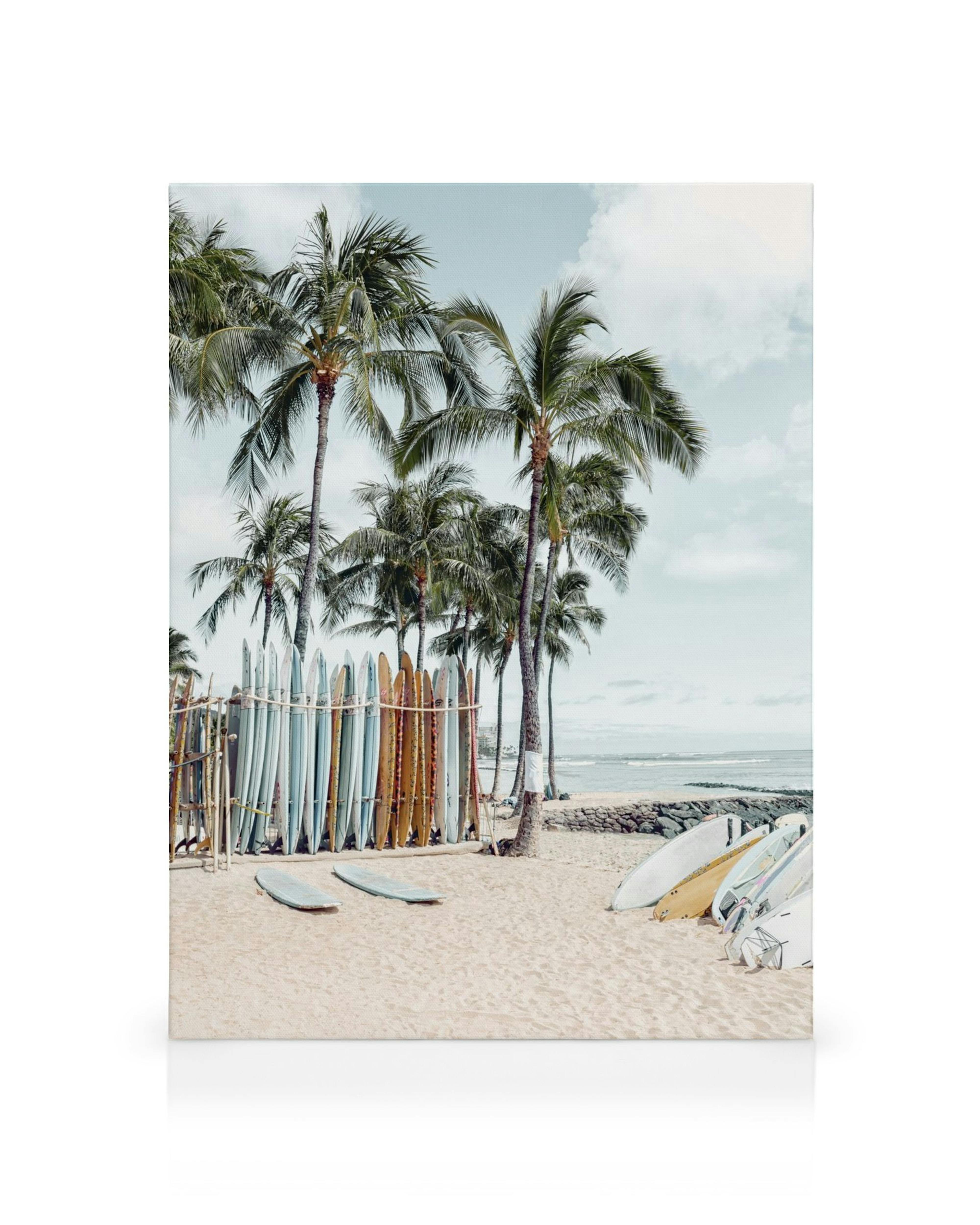 Waikiki surfing canvas with palm trees, a rack of surfboards, and the ocean in the background.