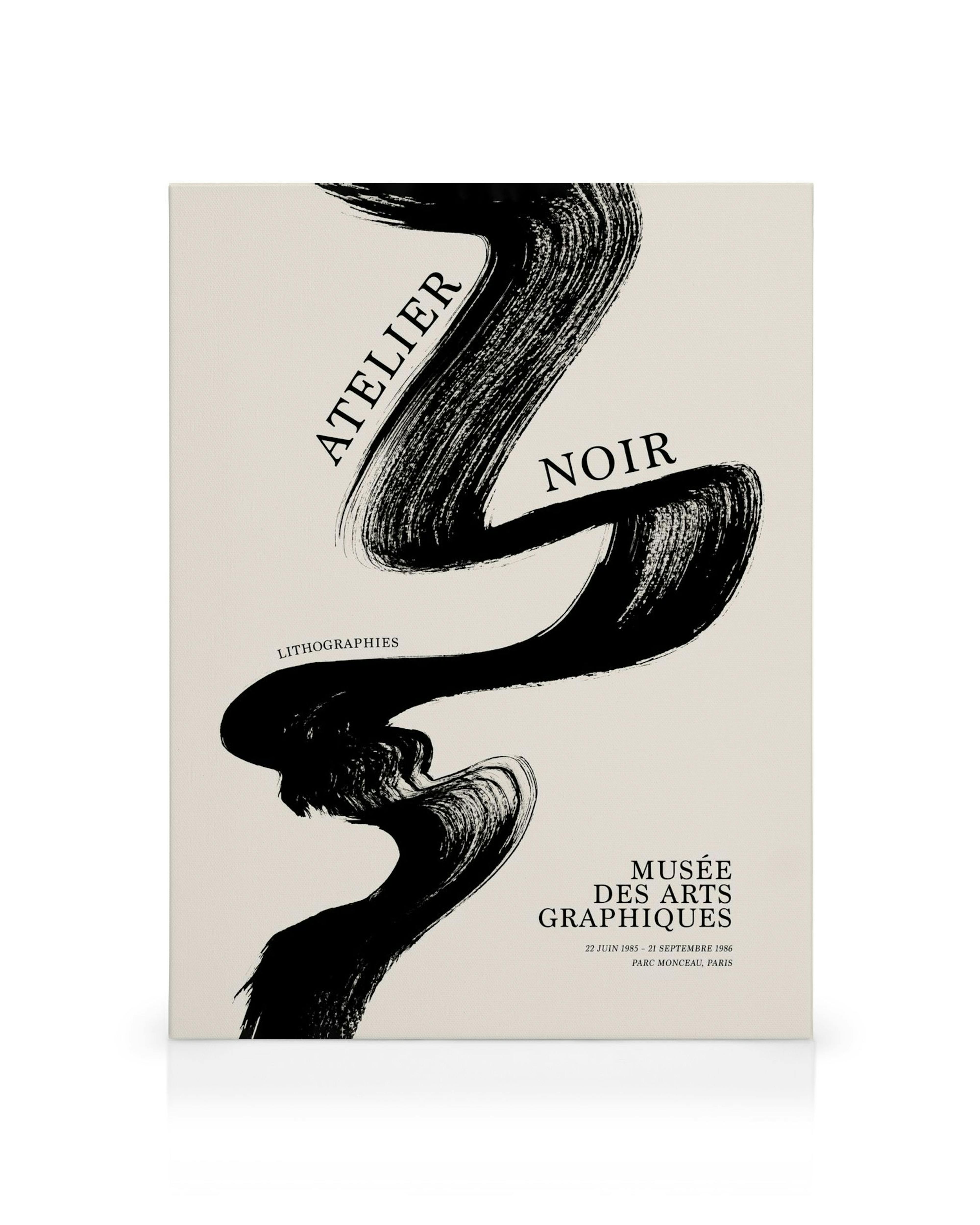 Black brush stroke canvas print with Atelier Noir text and Parisian details on a white background.