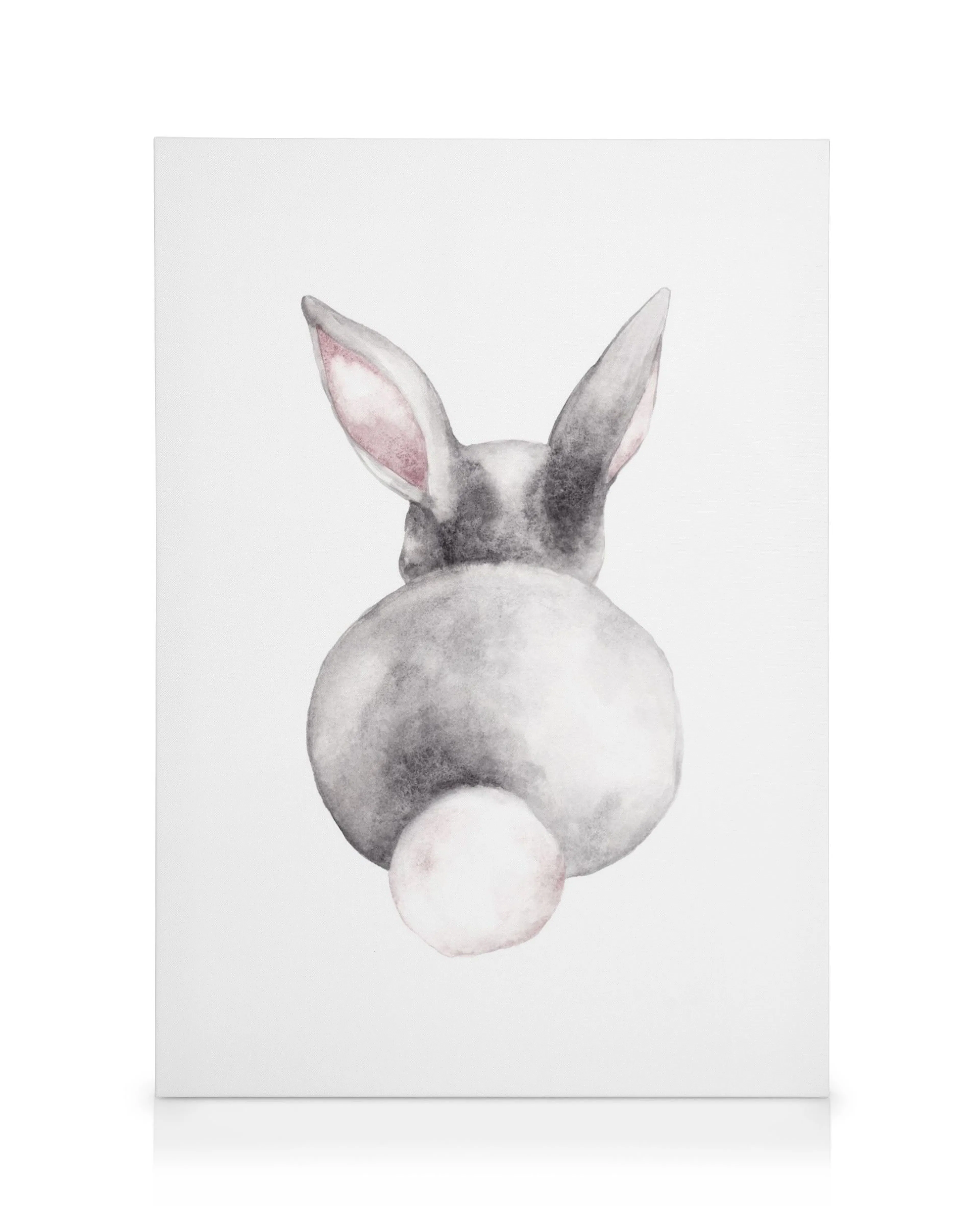 Watercolor bunny canvas print, showing the back of a grey and white rabbit with pink ears and a fluffy tail.