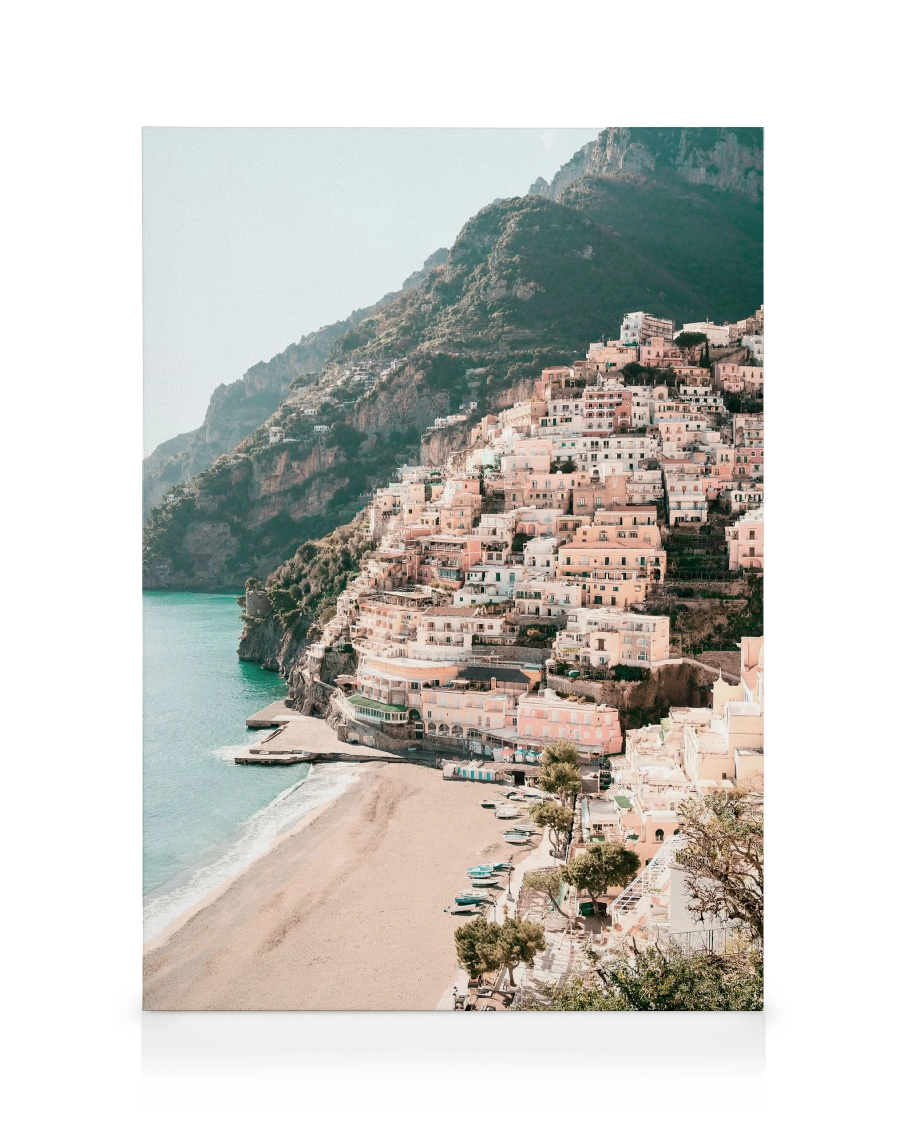 Leinwandbild Positano Küstenstadt am Hang mit Sandstrand, türkisblauem Meer und Bergen im Hintergrund.