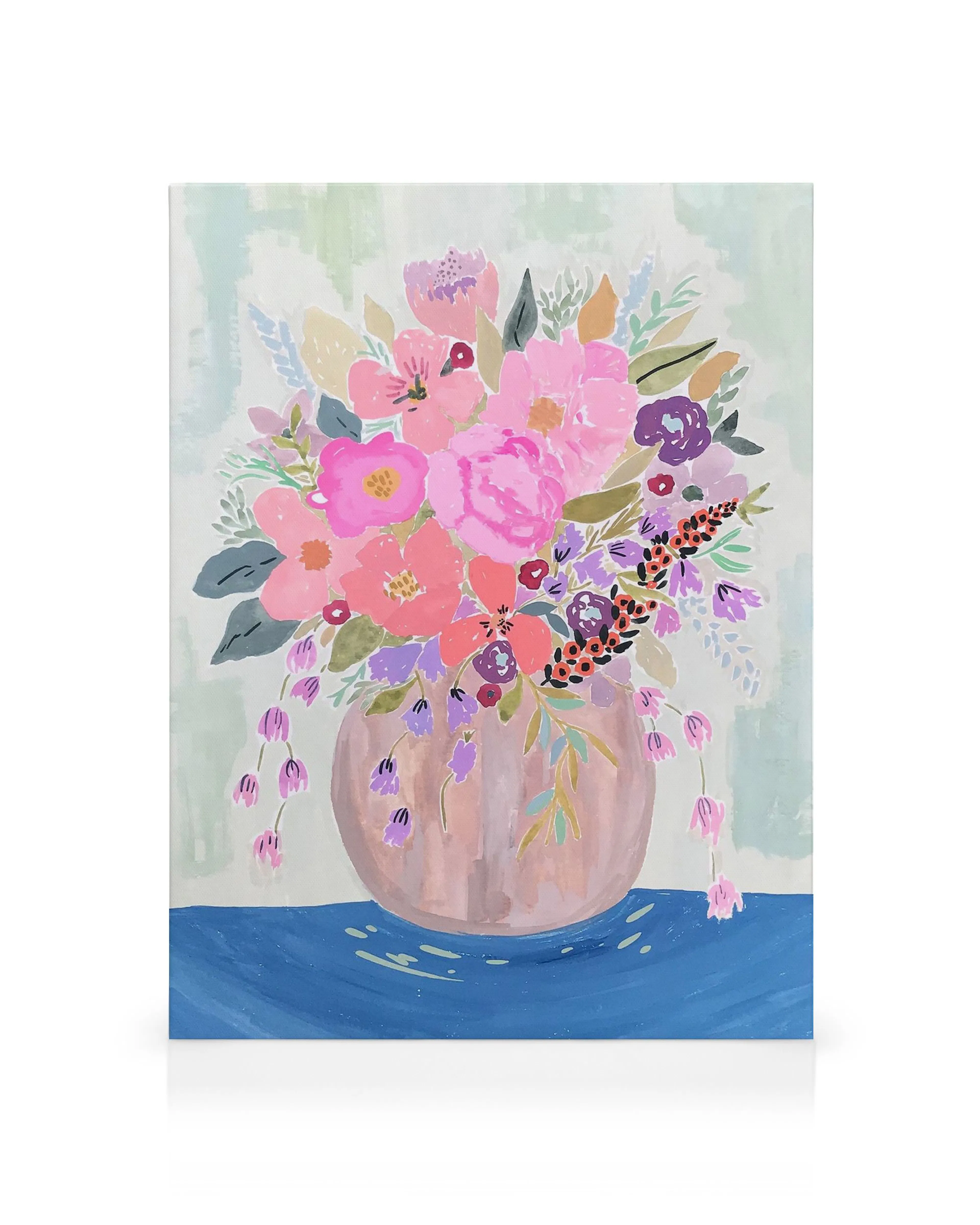 Vibrant floral bouquet in a round vase on a blue table, a colourful garden florals canvas print.