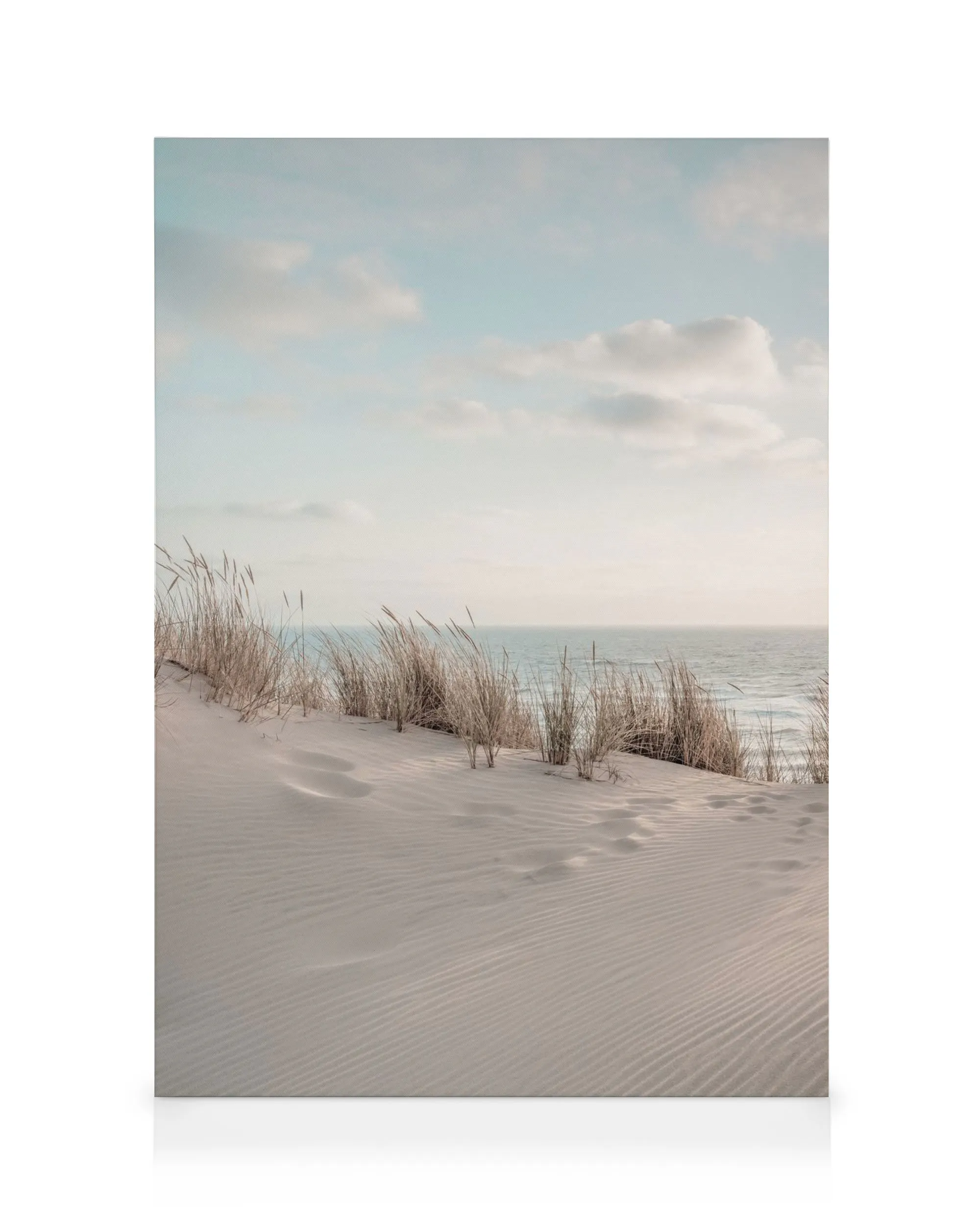 Dune Beach No1 canvas print, a serene landscape with sand dunes, tall grasses, and ocean under a blue sky.