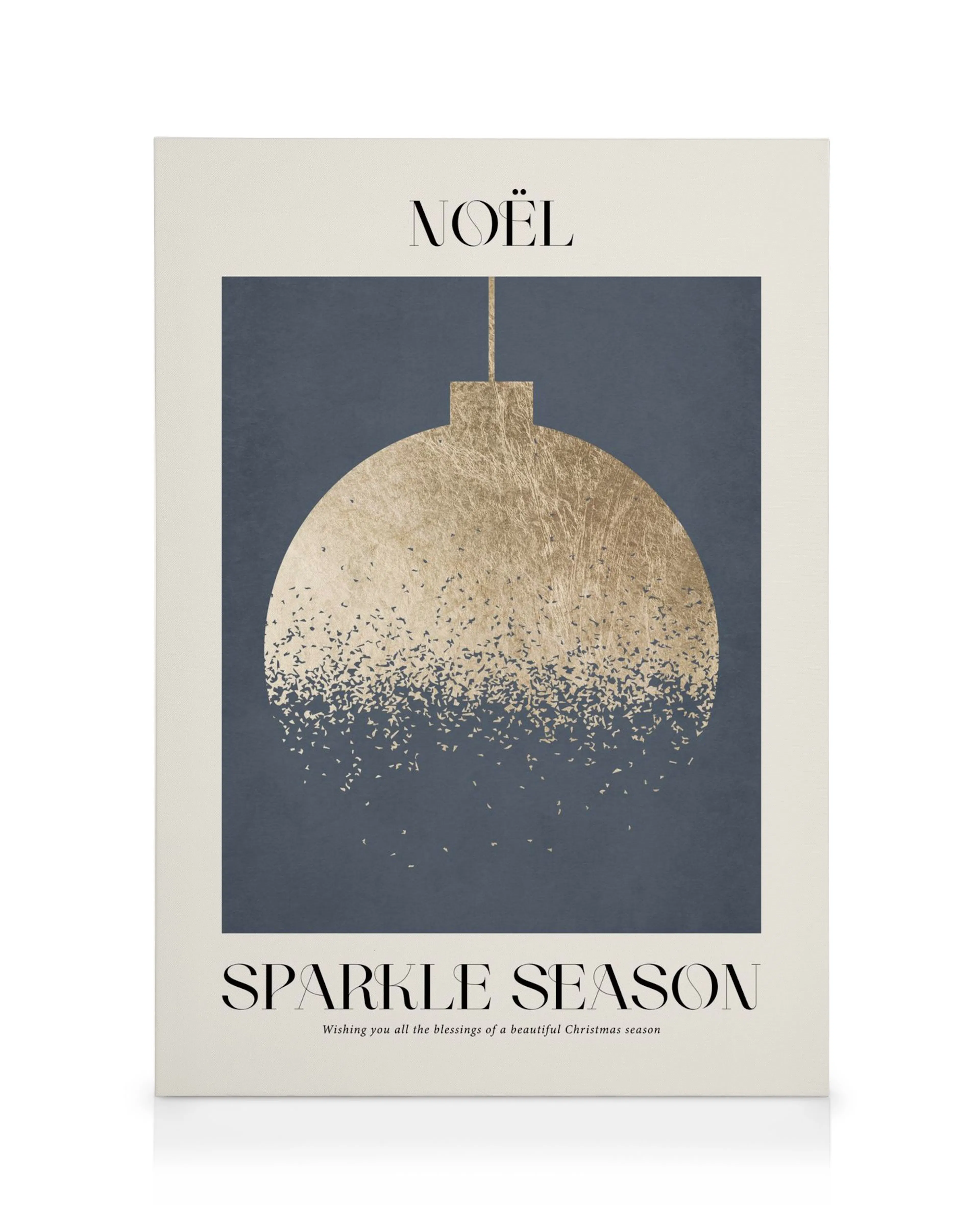 Canvastavla med guldig julgranskula mot blå bakgrund, texten NOËL och SPARKLE SEASON för juldekoration.