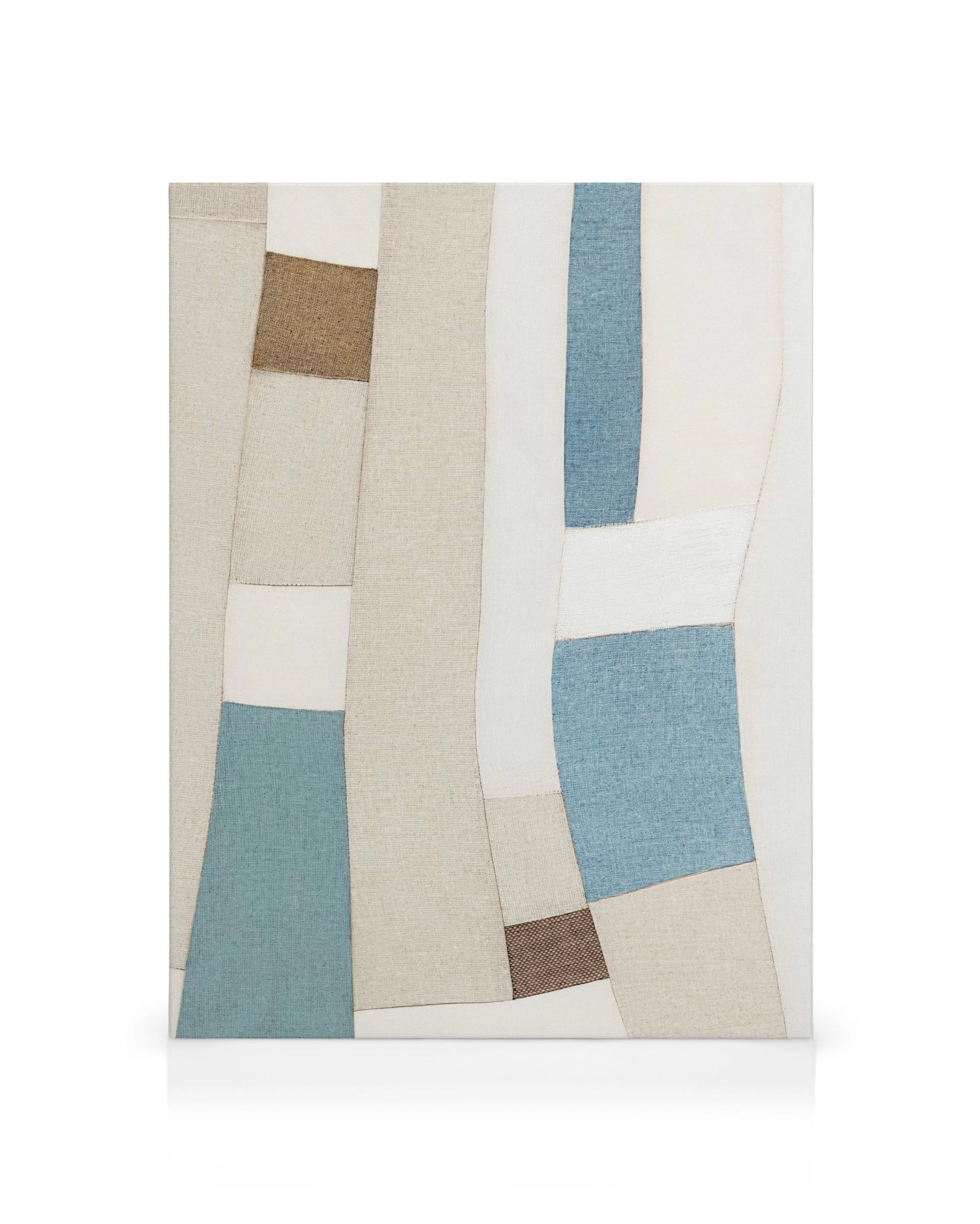 Abstract canvas print with a patchwork design in blue, beige, white, and brown with a woven textile appearance.