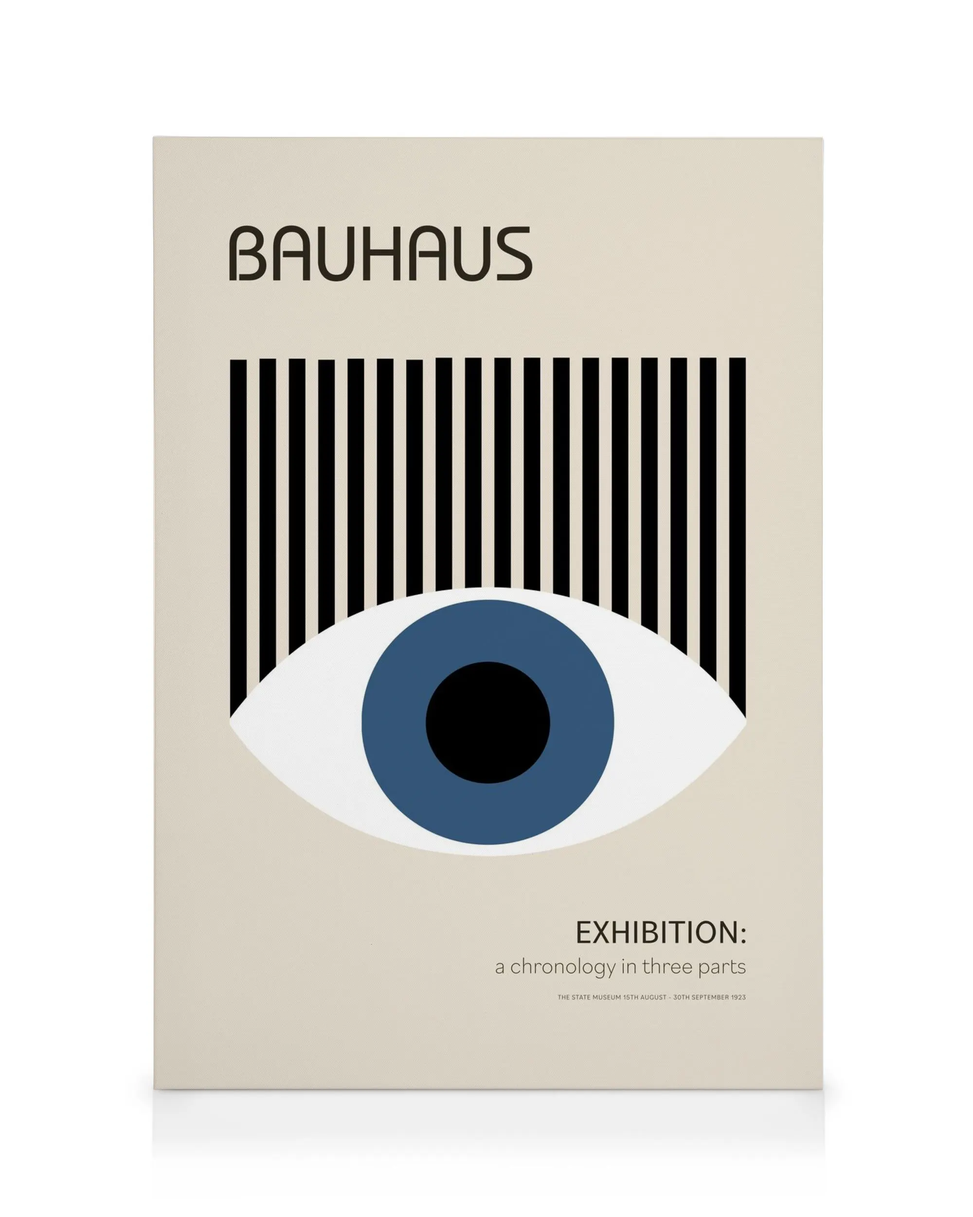 Bauhaus-lerret med blå iris, svarte øyenbryn og BAUHAUS-tekst på beige bakgrunn.