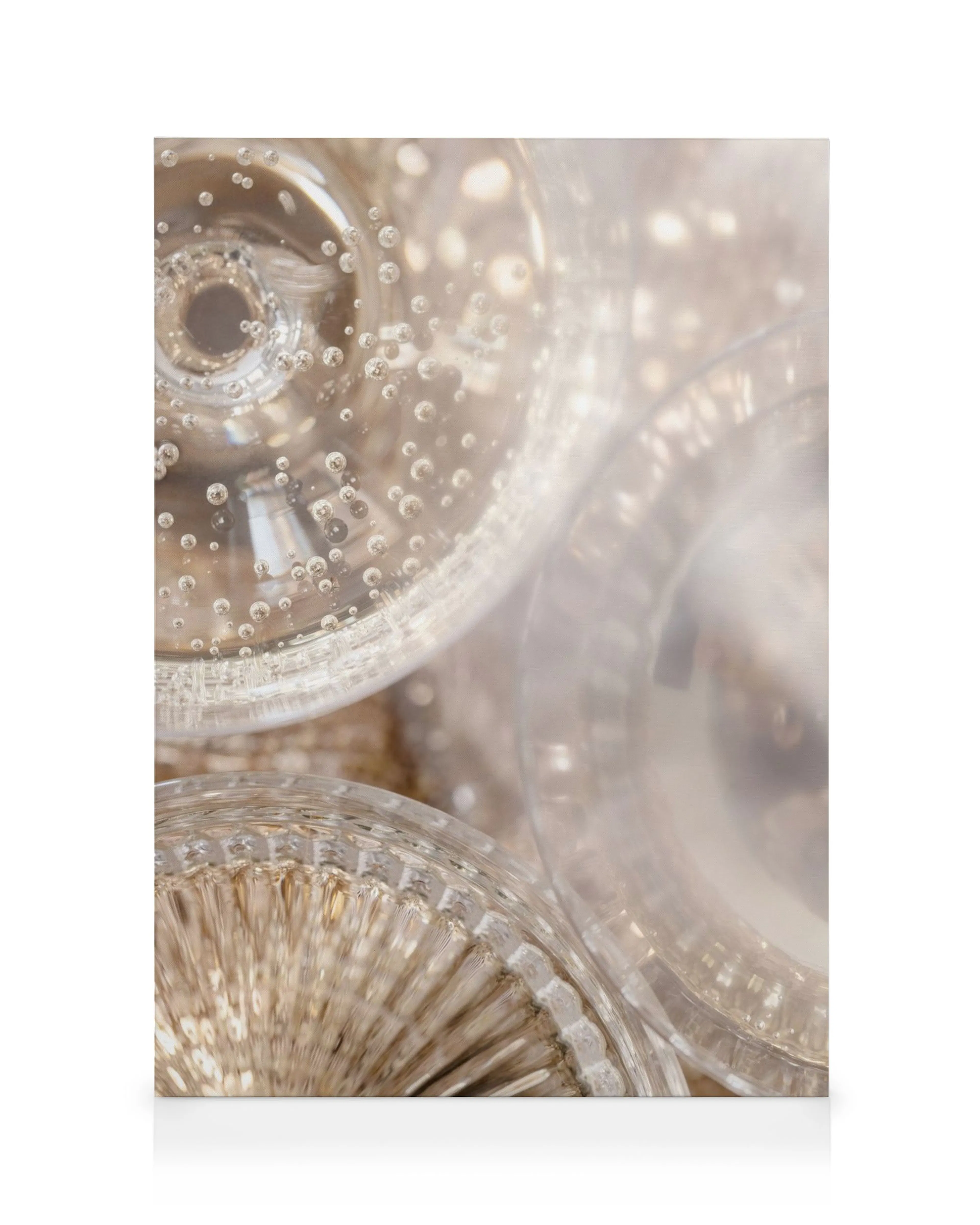 Close-up of clear plastic objects with effervescent bubbles and soft white and beige tones, forming a captivating canvas print.