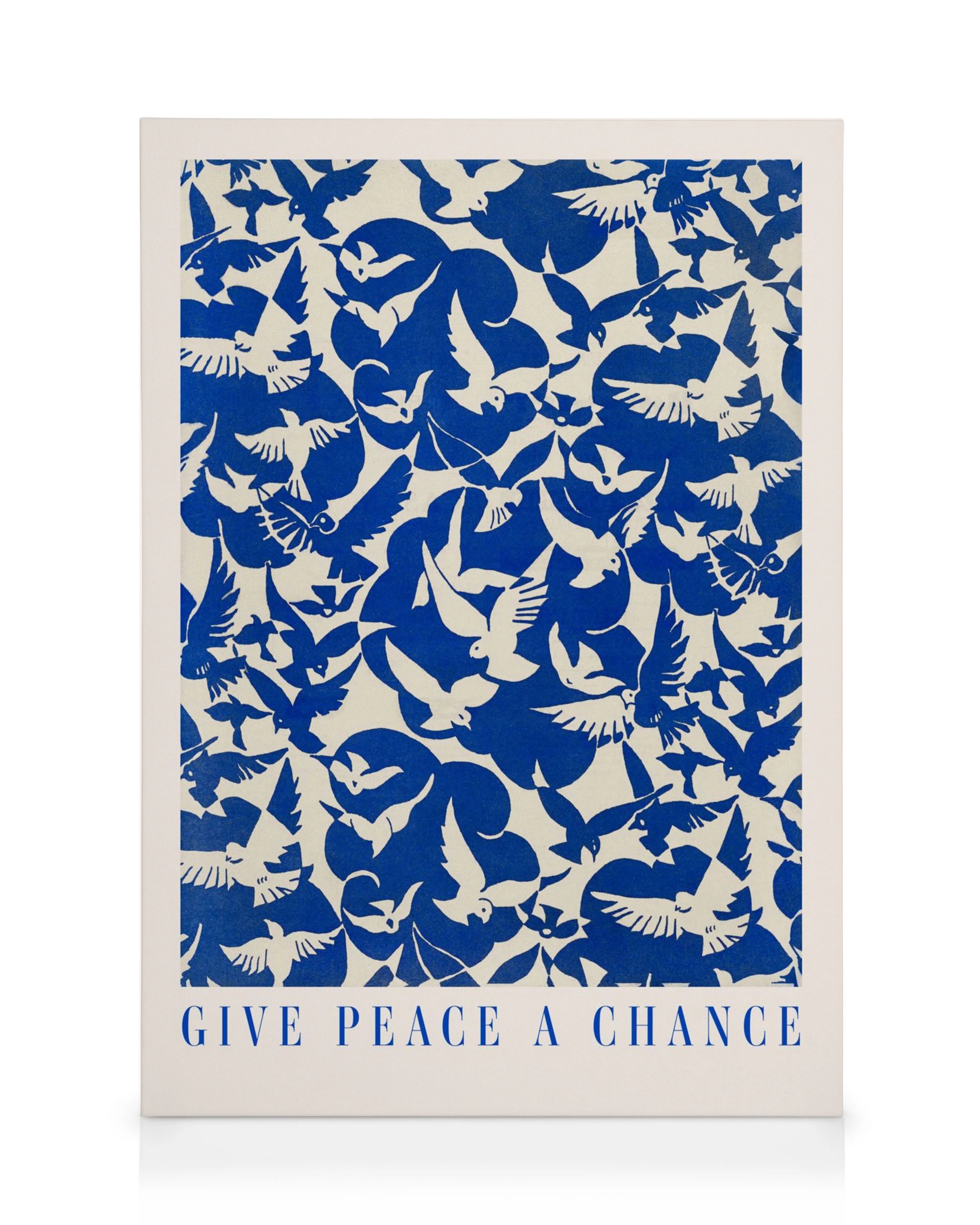 Toile avec des formes de colombe blanches et bleues sur fond bleu clair avec le texte Give Peace a Chance
