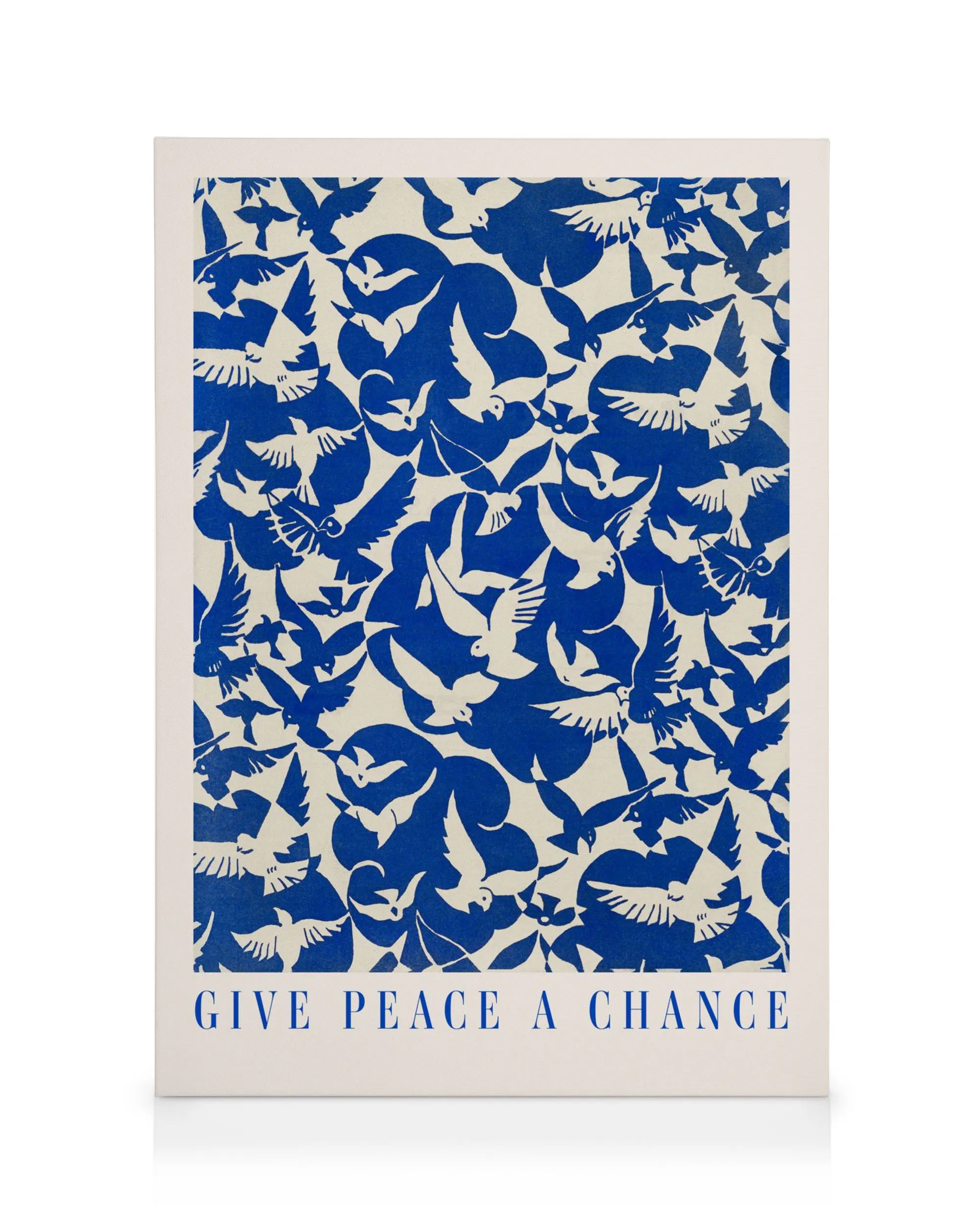 Toile bleu avec des colombes blanches et bleues, et le texte Give Peace a Chance en typographie bleue