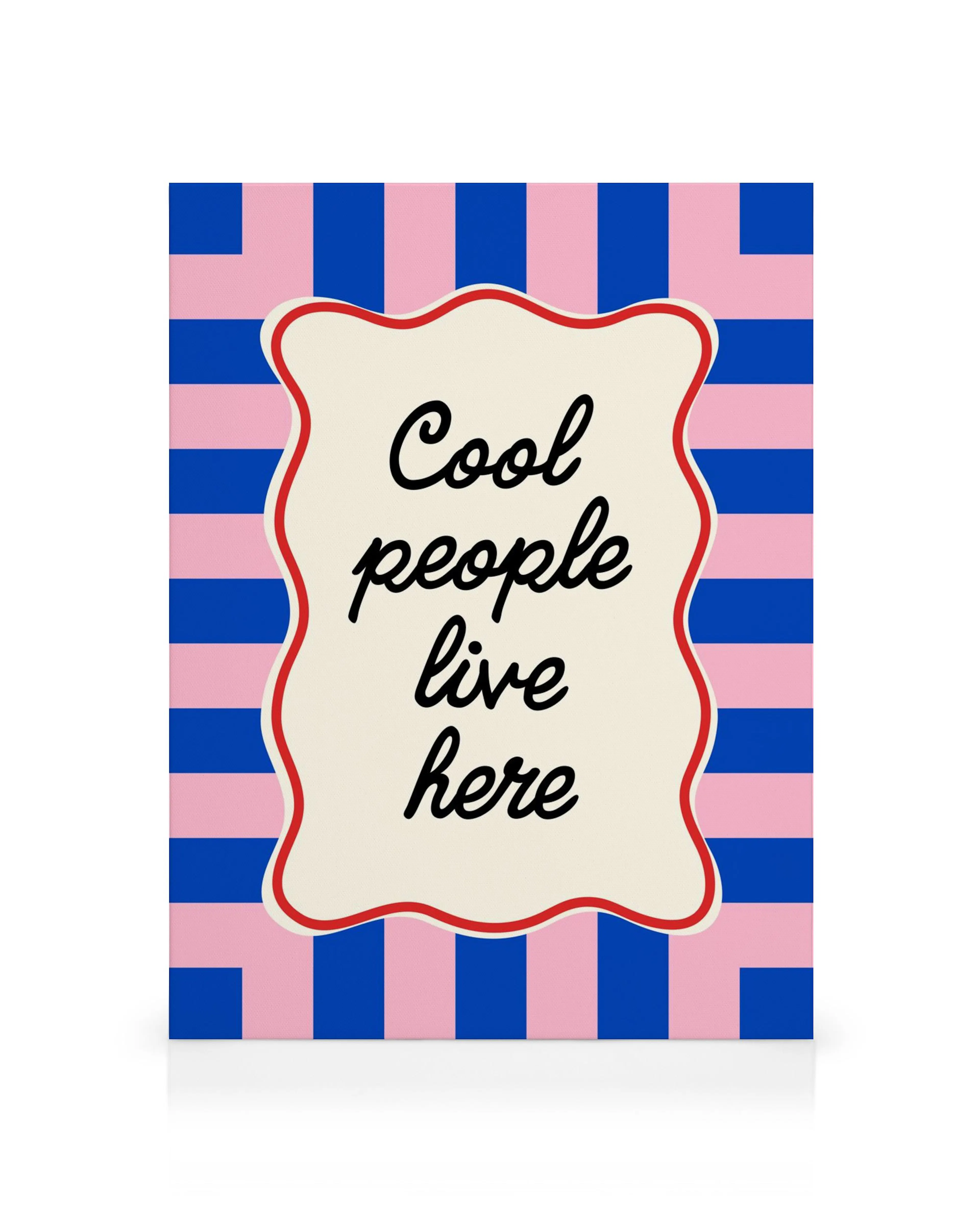 A canvas print with a wavy cream-colored border, red outline, and text Cool people live here on a blue and pink striped backgrou