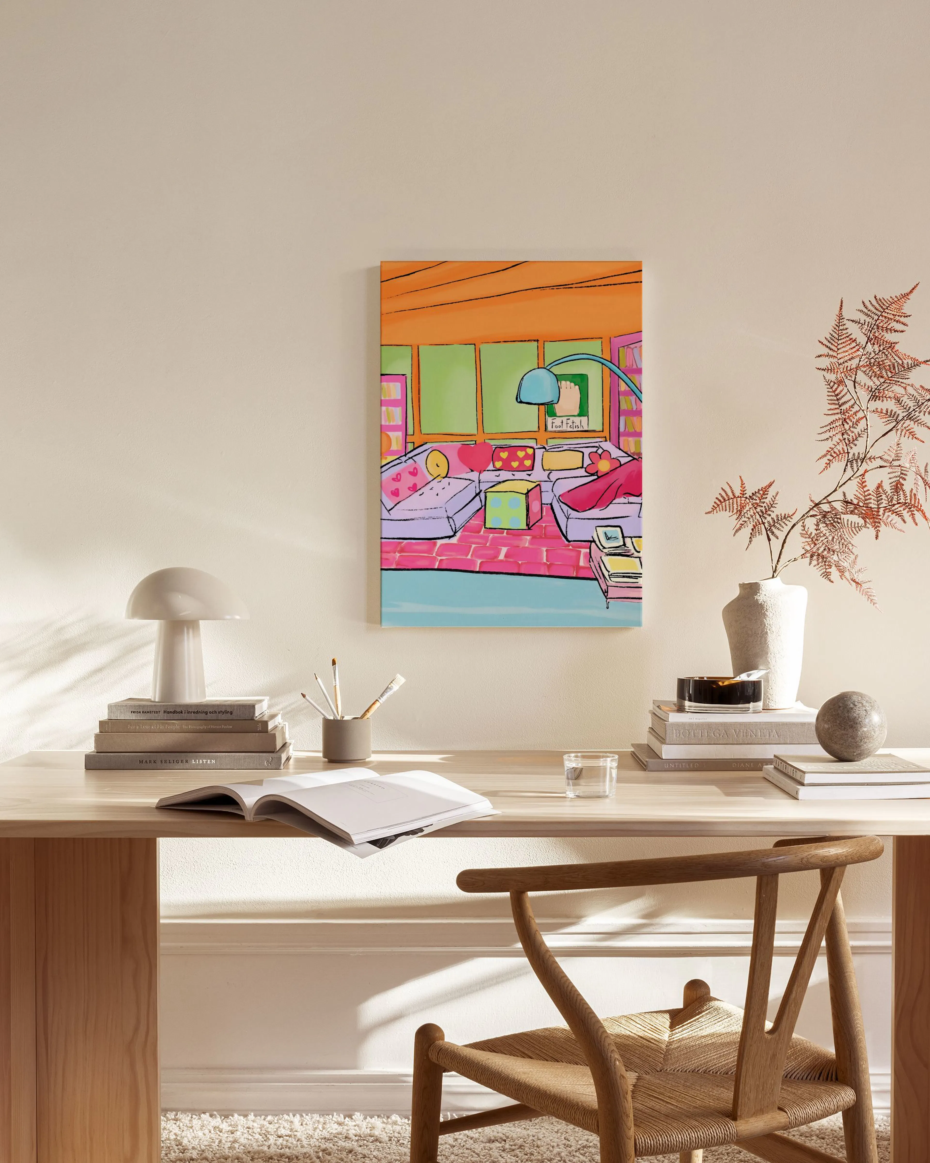 A vibrant pop art canvas print of a living room with pink sofas and a green wall, displayed in a modern home.