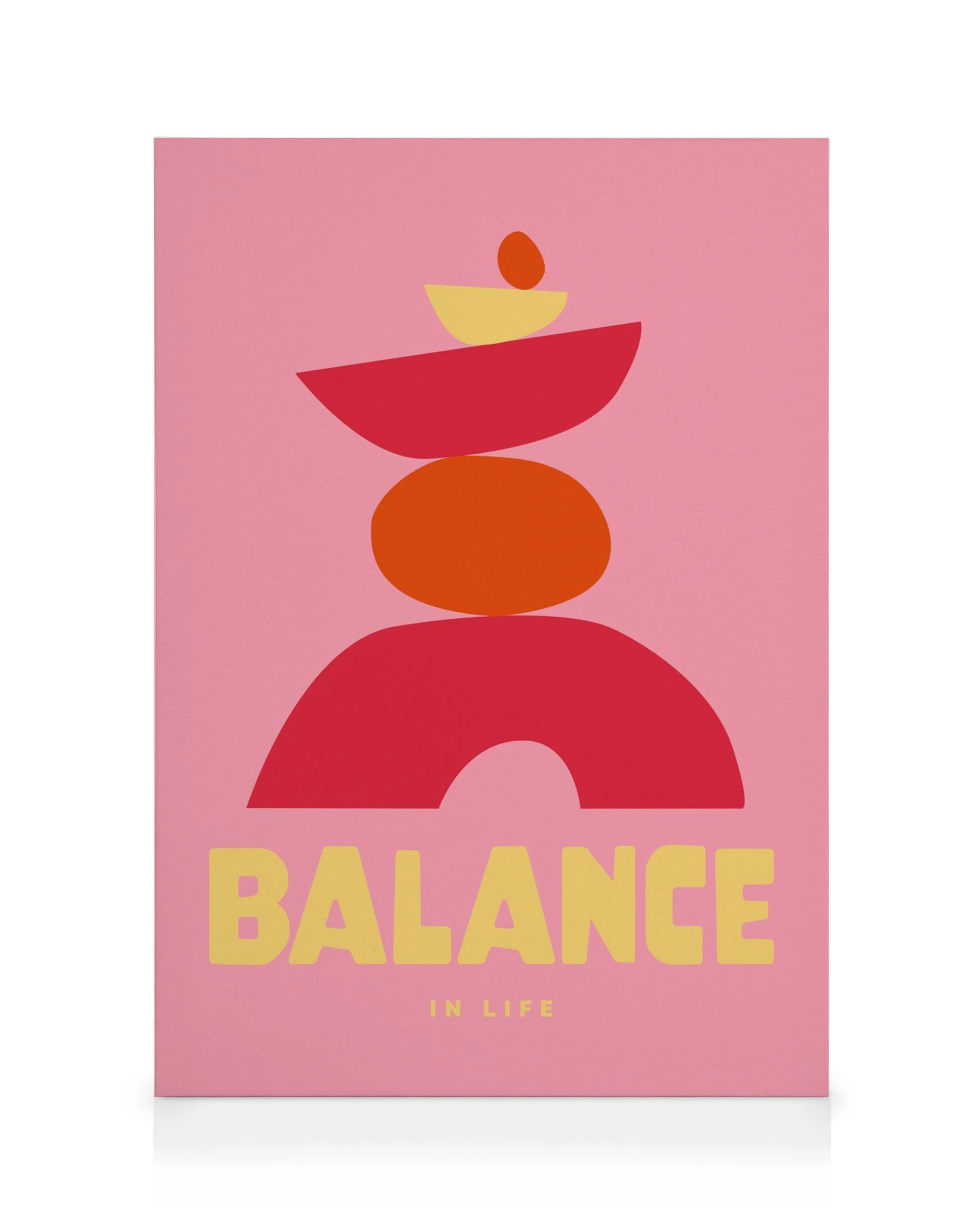 Graphic abstract canvas print with stacked red, orange, and yellow shapes on pink, BALANCE text below.