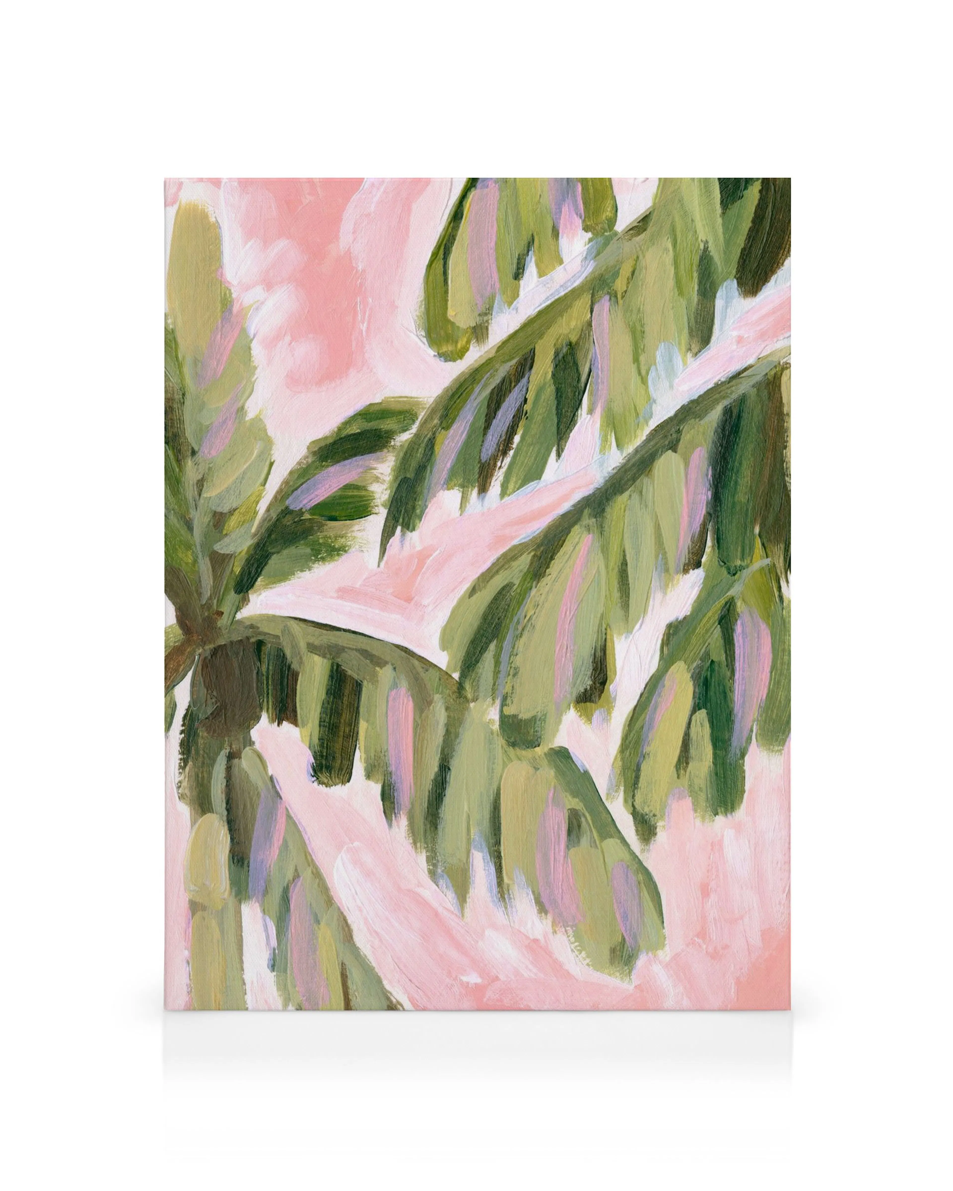 Botanical canvas print with green palm leaves and visible brush strokes on a pink background, tropical wall art.