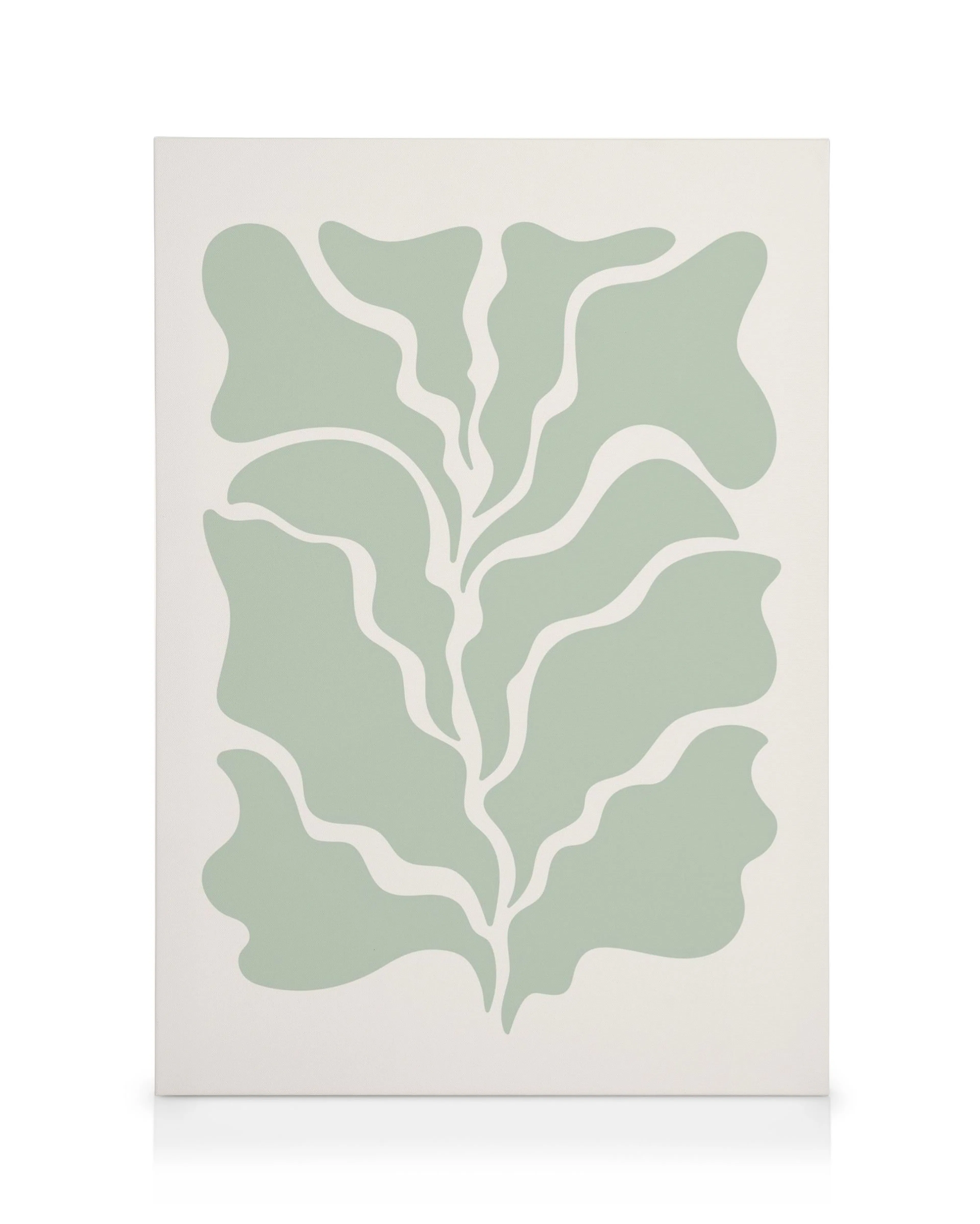 Graphic green leaf canvas print, featuring a simplified botanical design with light green organic shapes on a cream background.