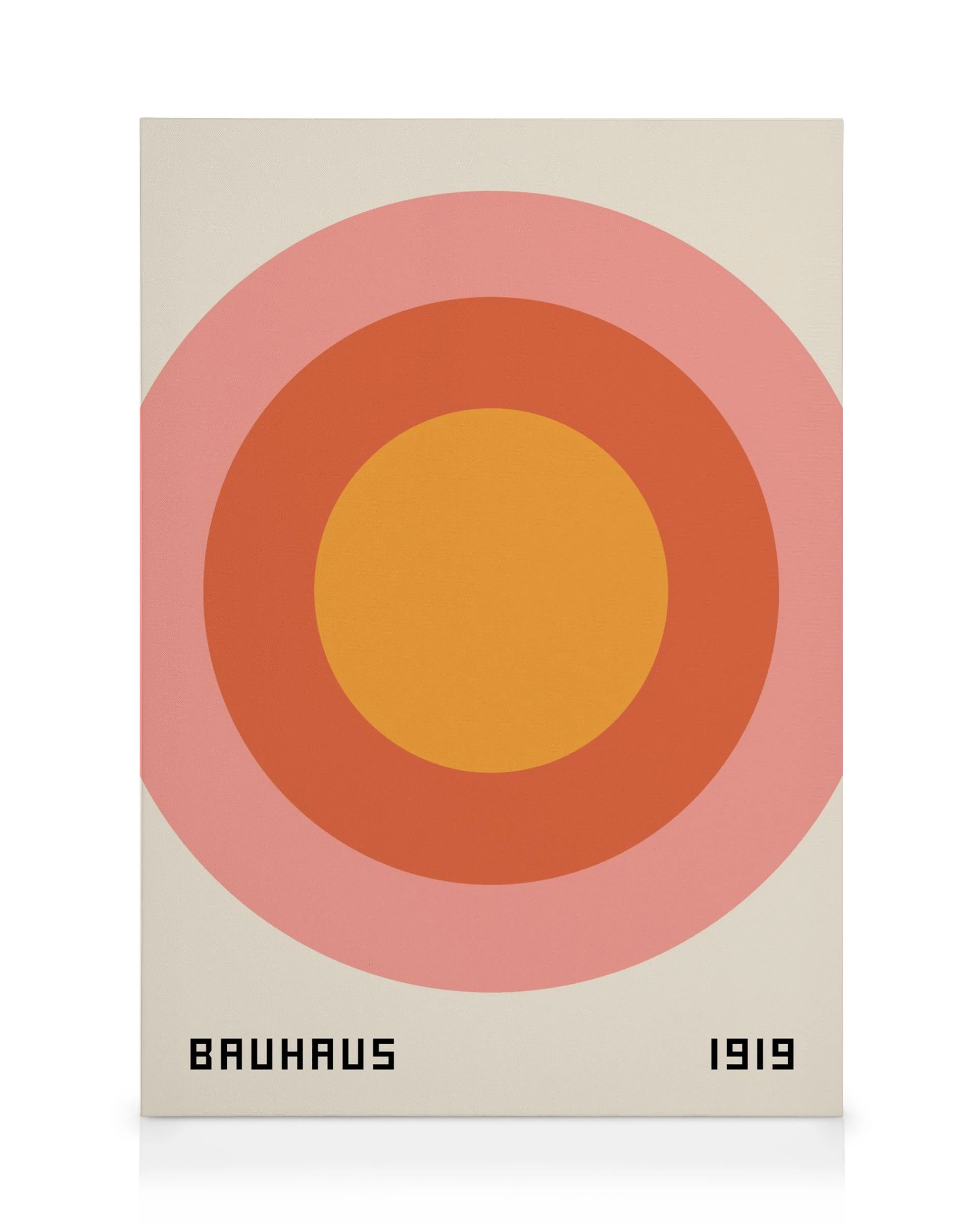 Toile Bauhaus 1919 avec trois cercles superposés jaune, rouge, rose sur fond beige et typographie.