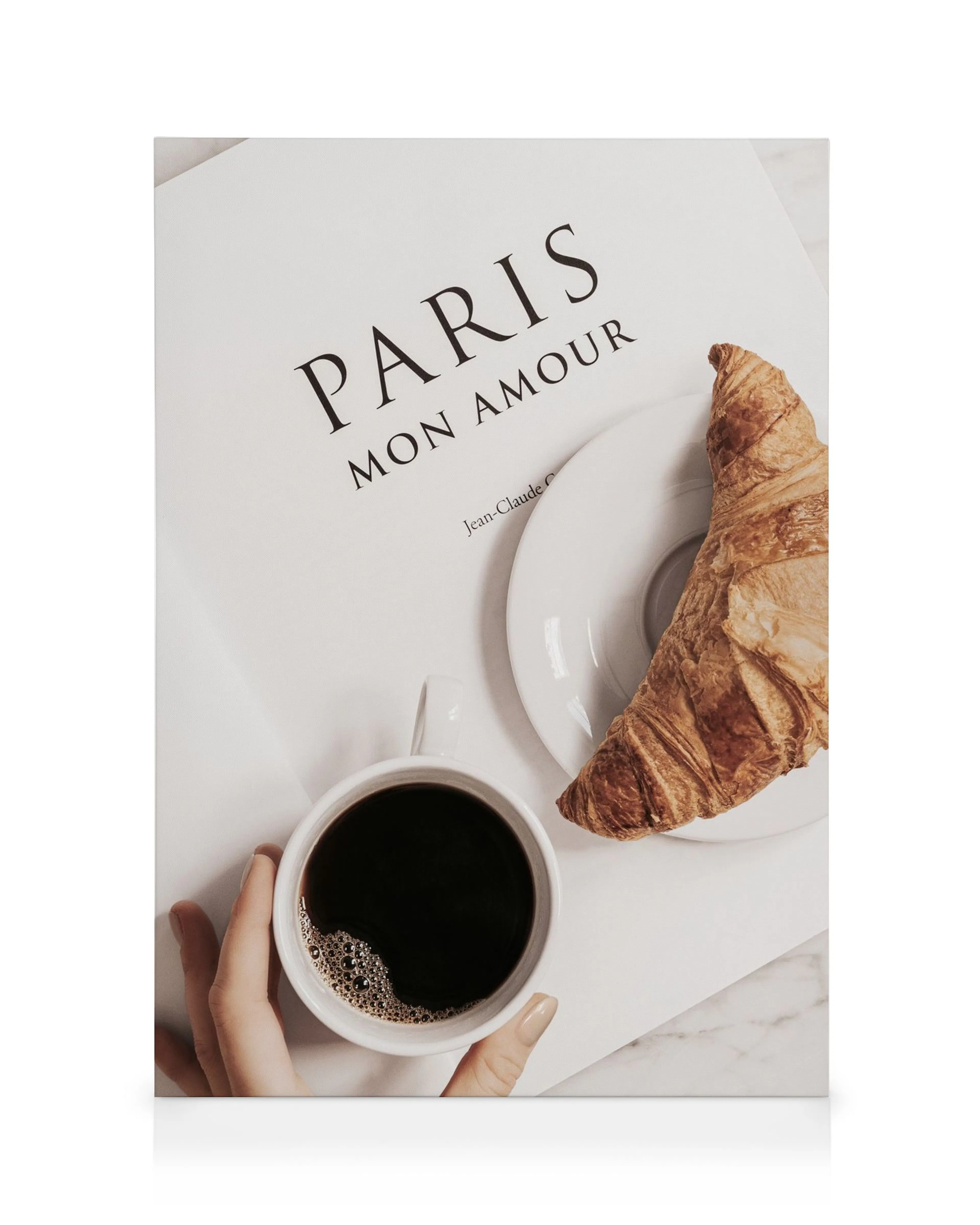 Breakfast in Paris canvas print featuring a hand holding a coffee cup, a croissant, and Paris Mon Amour text.