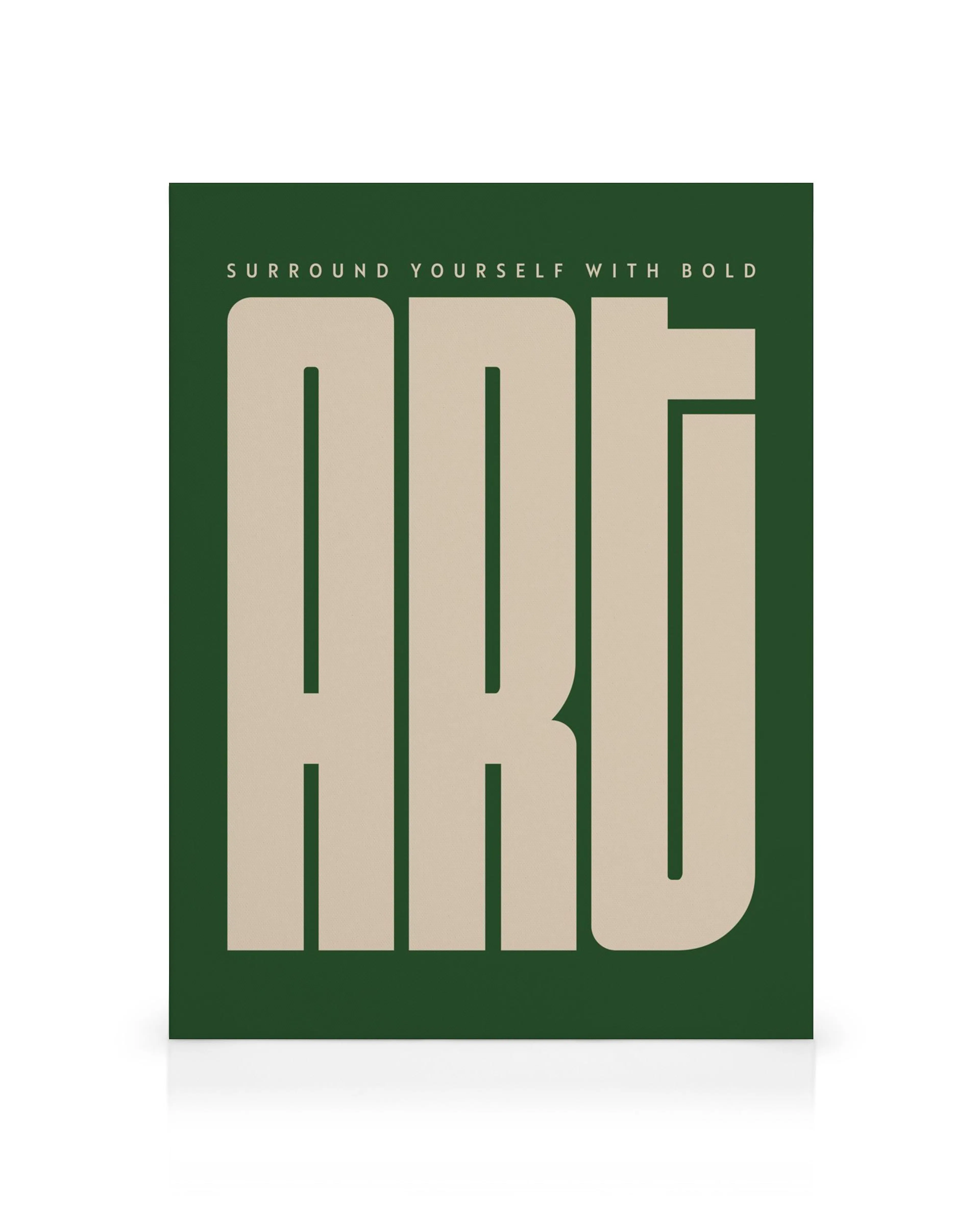 A canvas print featuring the word ART in large beige letters on a dark green background, with SURROUND YOURSELF WITH BOLD above.