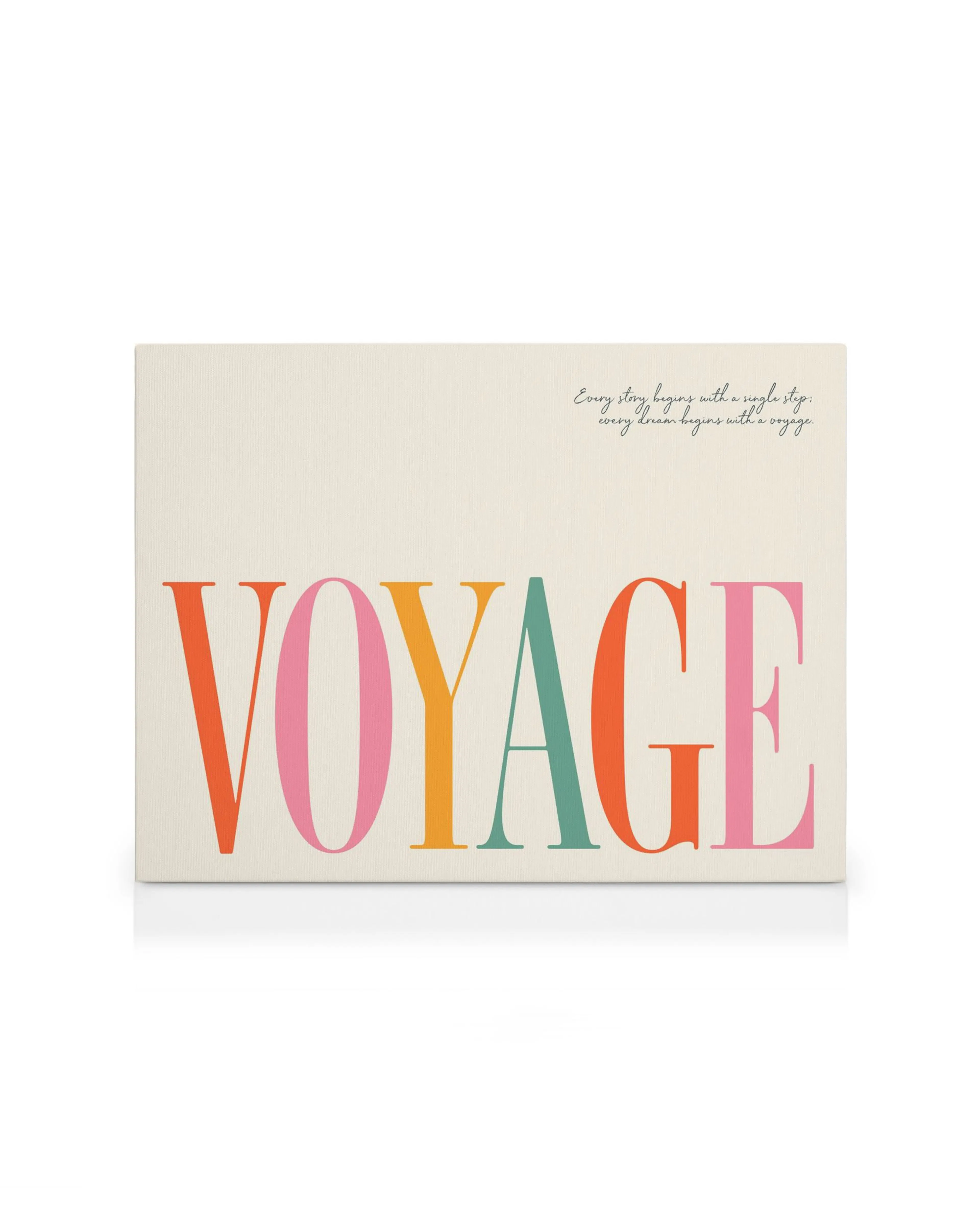 A canvas print with VOYAGE in colourful letters and a quote Every story begins with a single step; every dream begins with a voy
