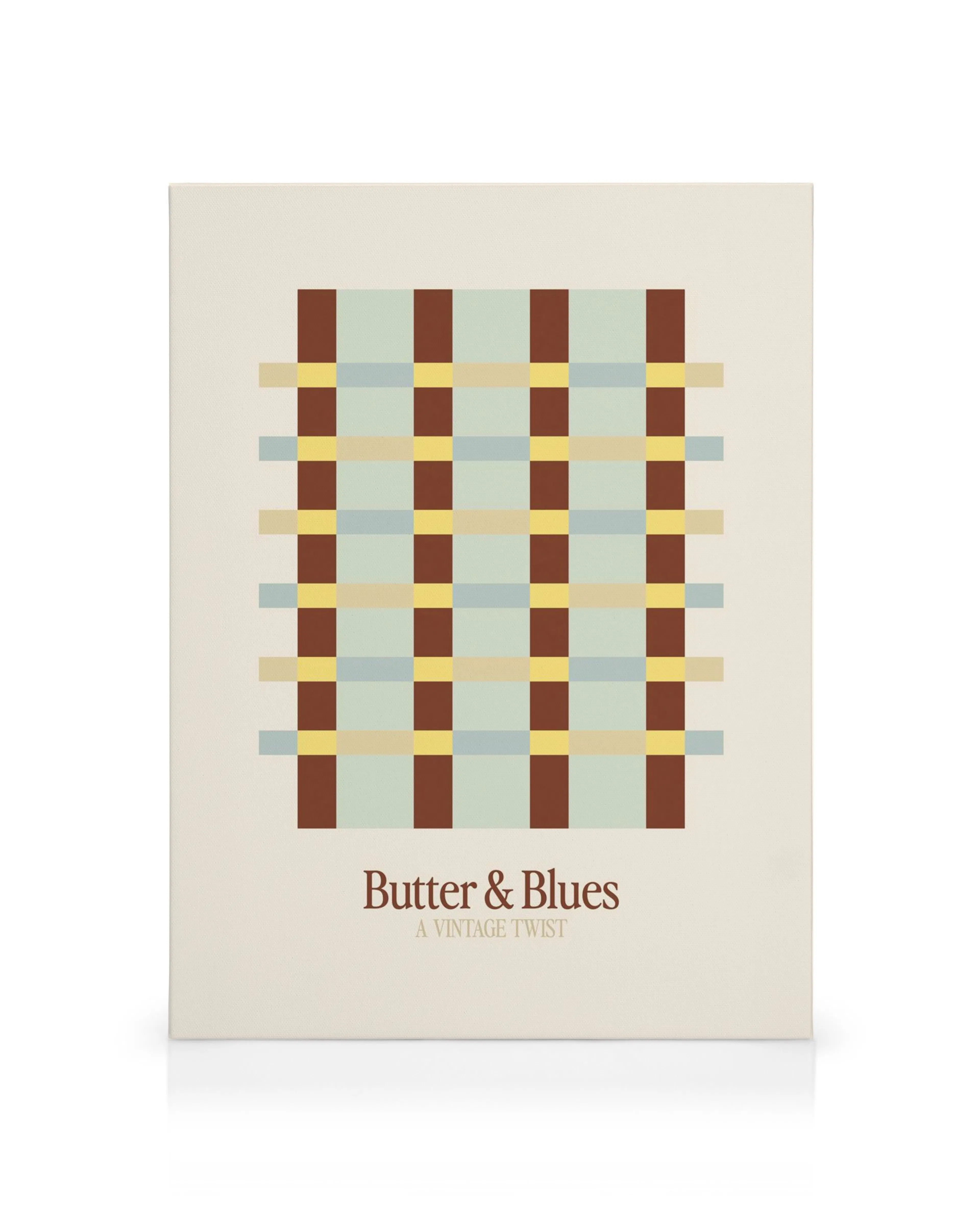 Tela decorativa com padrão de axadrezado em tons de castanho, amarelo, azul e bege, com o texto Butter & Blues.